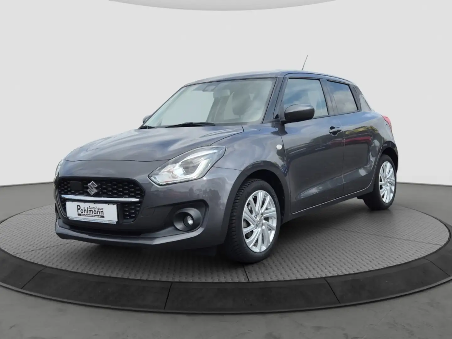 Suzuki Swift 1.2 HYBRID Comfort LED DAB SHZ Totwinkelassistent Grijs - 1