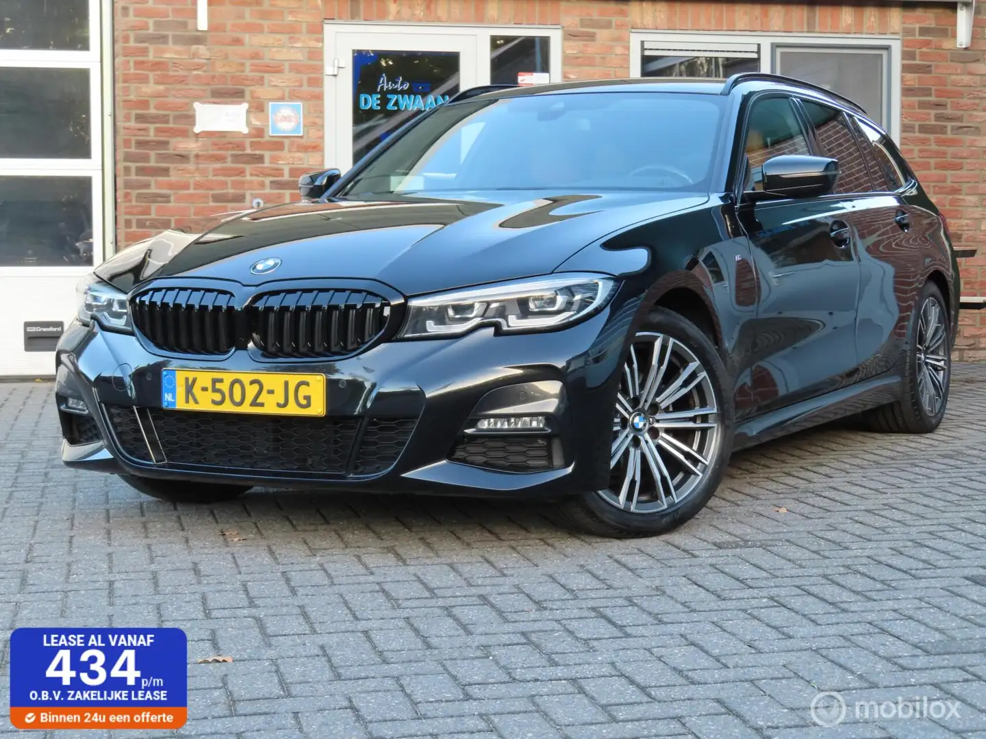 BMW 320 3-serie Touring 320i High Executive M-Sport Editio Zwart - 1