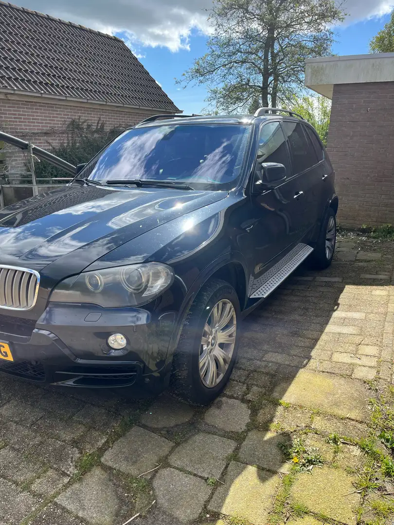 BMW xDrive48i Zwart - 1