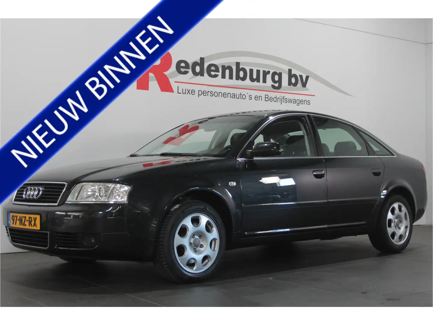 Audi A6 Limousine 2.4 MT - Automaat - Navi / Stoelverw. / Zwart - 1