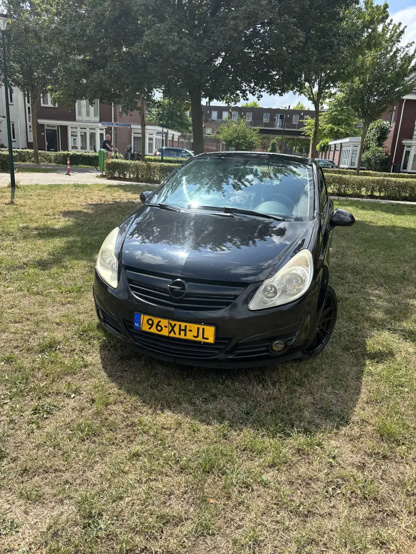 Opel Corsa 1.4-16V Enjoy Zwart - 2