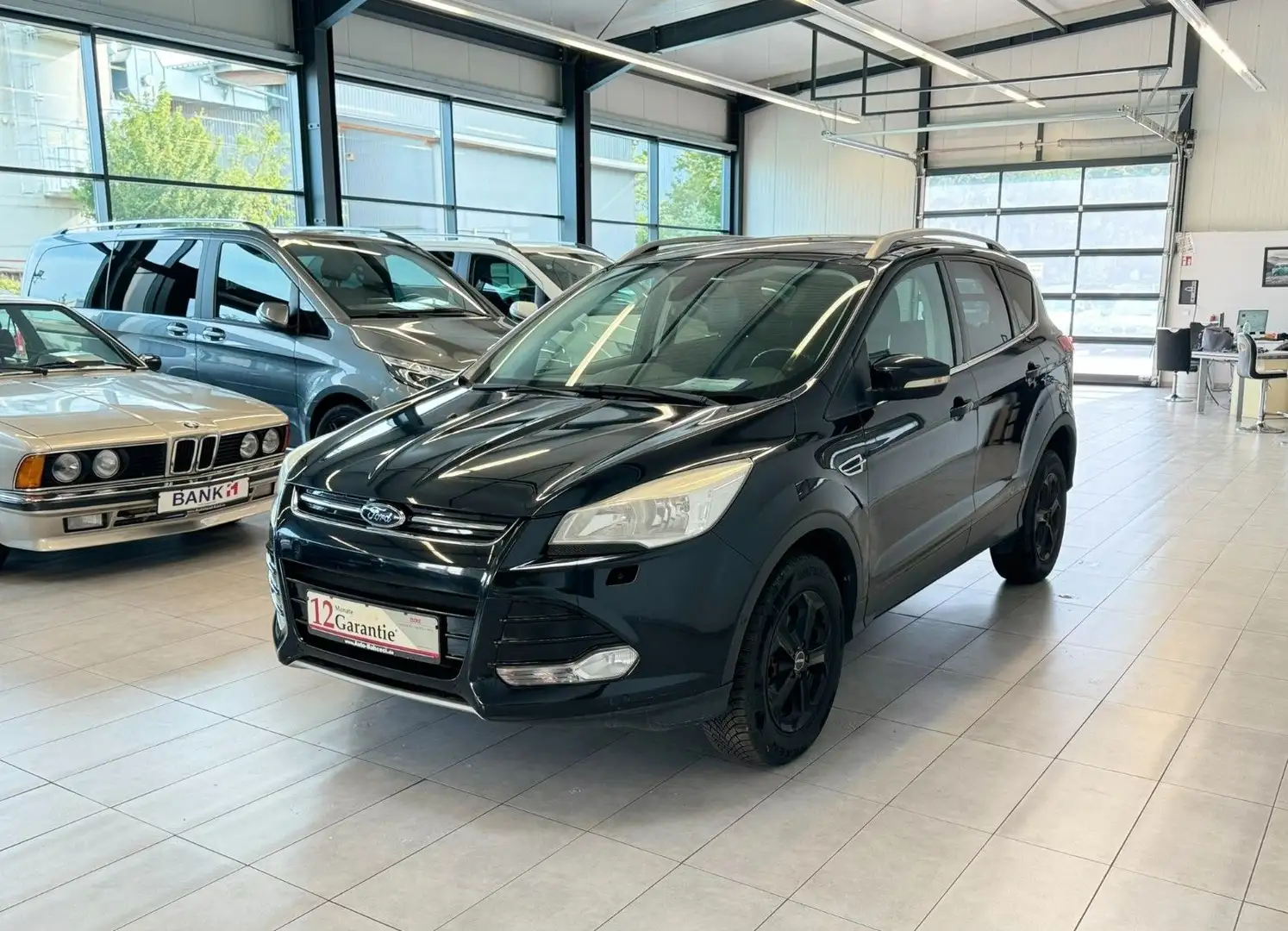 Ford Kuga 2.0 TDCI 4x4 Titanium *Autom.*Tempomat*SHZ* Schwarz - 1