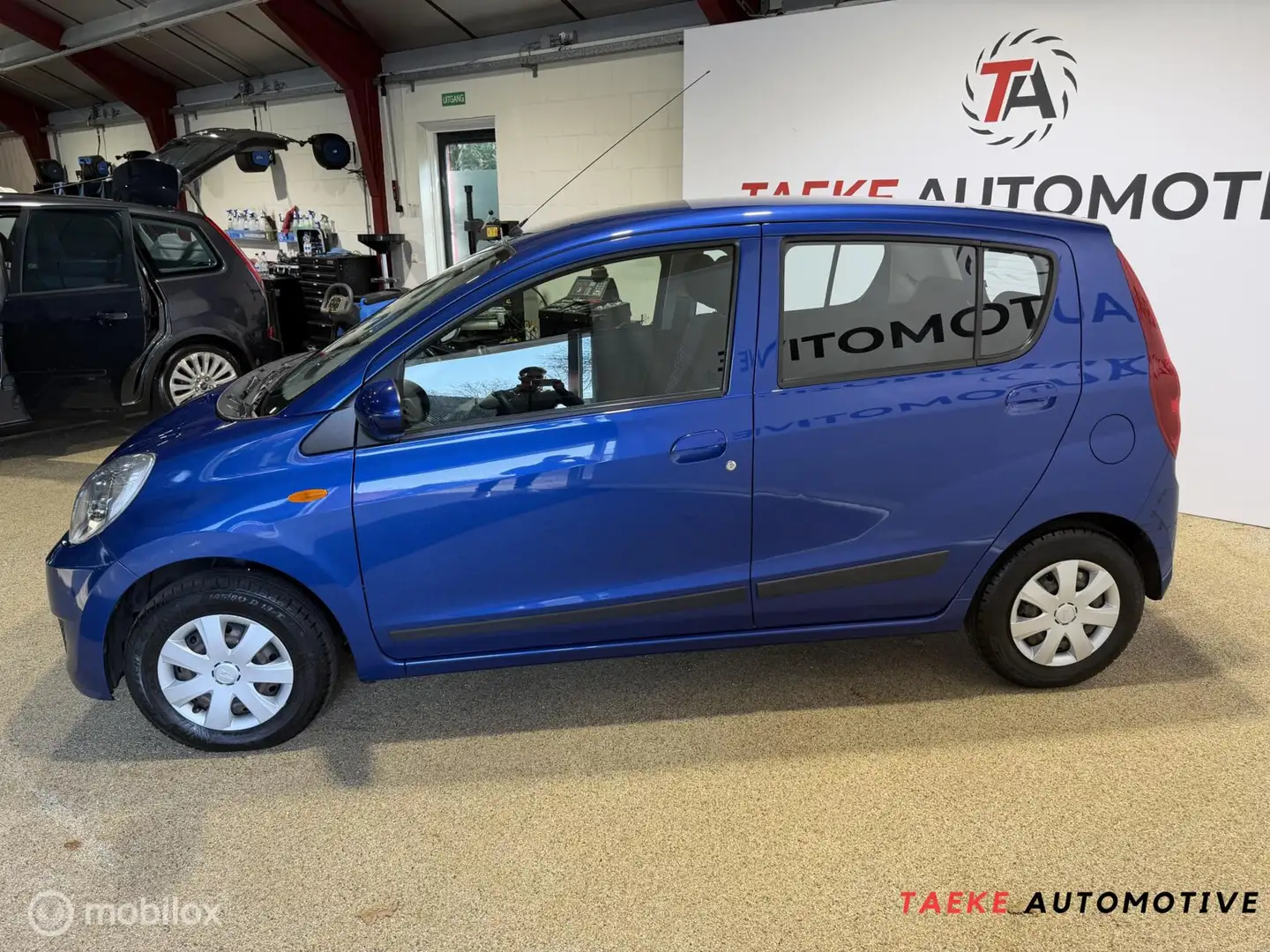 Daihatsu Cuore 1.0 Premium APK/Airco/1eEIG Azul - 2