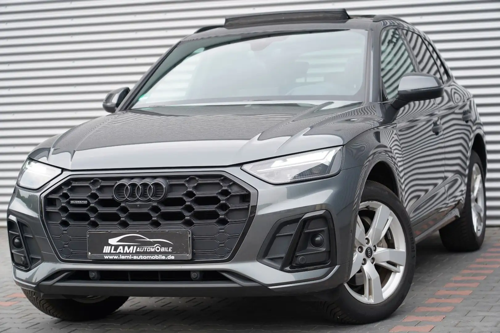 Audi Q5 40TDI quattro S line NAPPA PANO 360 AHK HUD Grijs - 1