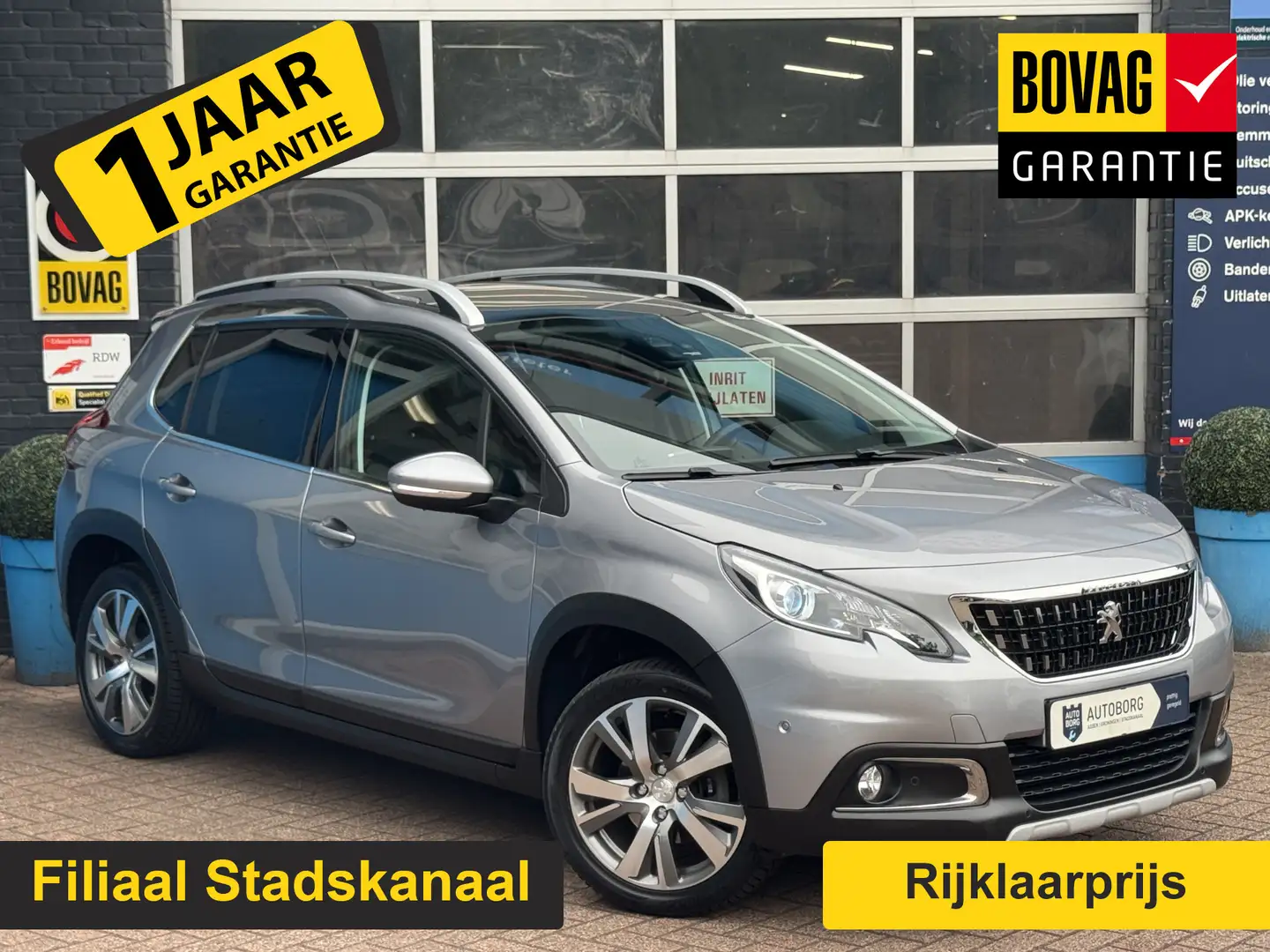 Peugeot 2008 1.2 PureTech Blue Lease Allure GRATIS Afleverpakke Grijs - 1
