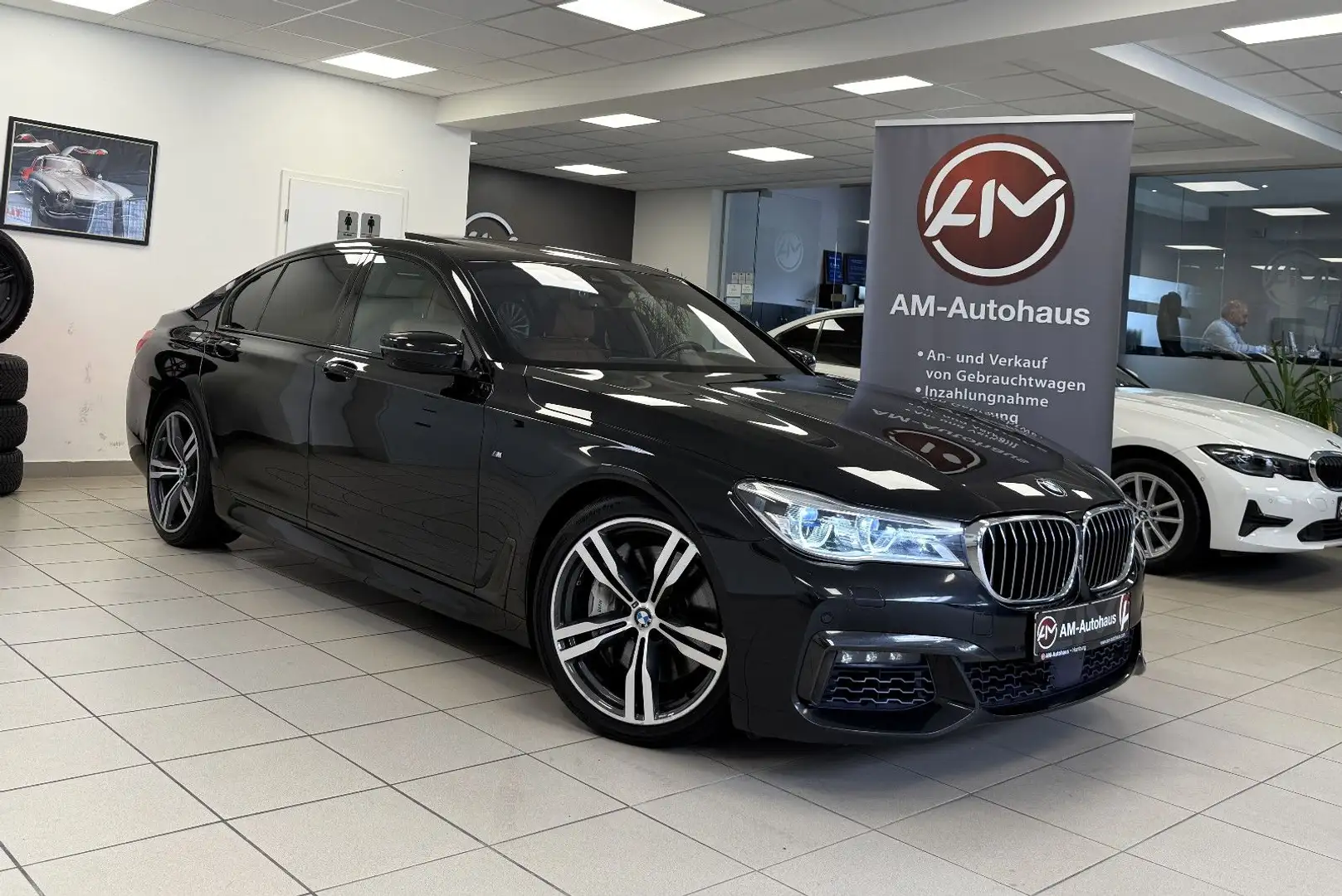 BMW 750 d xDrive *M-Sport*GlasSd*ACC*StdHg*Laser*360° Schwarz - 1