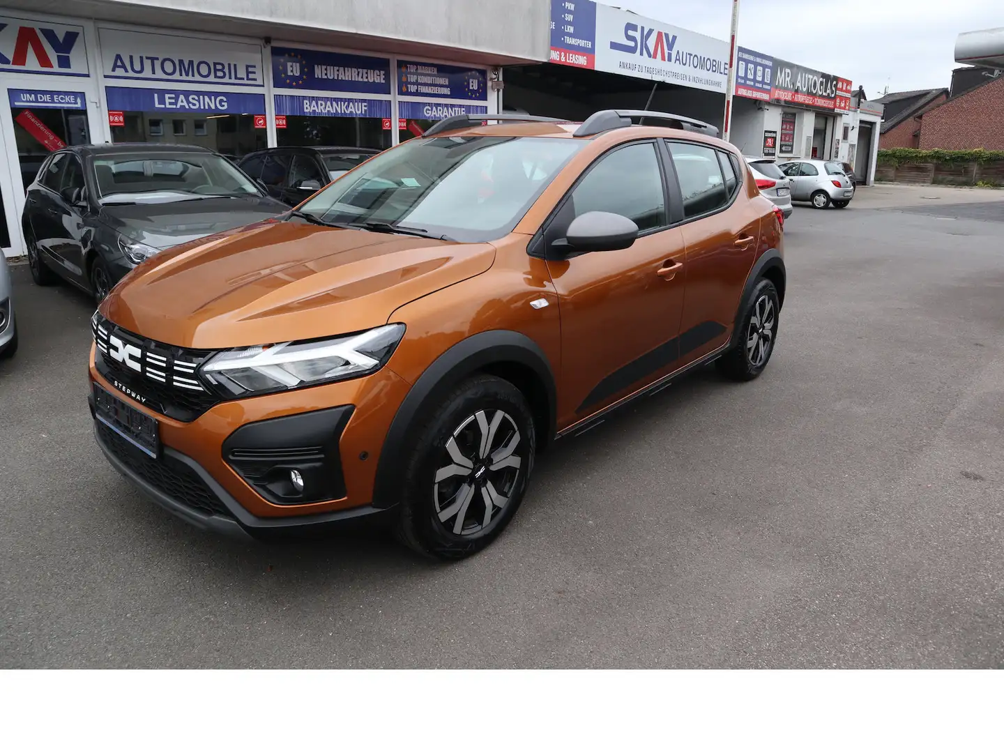 Dacia Sandero Stepway Expression+ Navi Scheckheft Bronze - 2