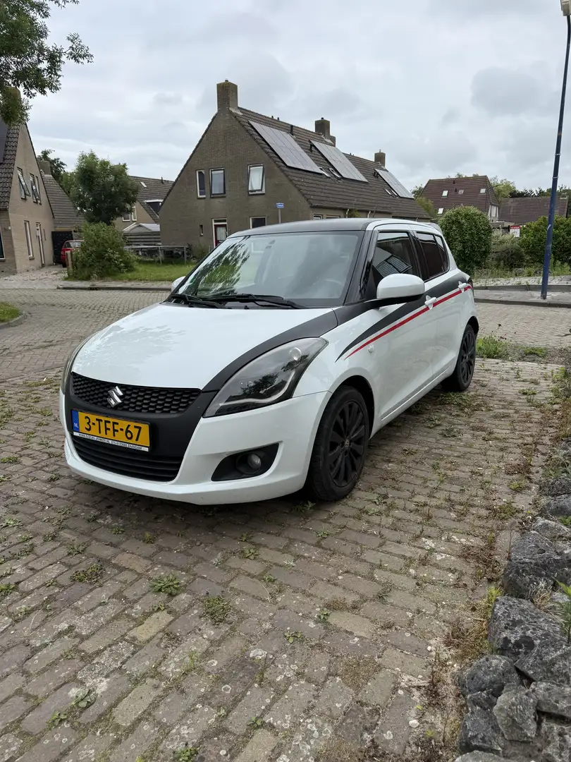 Suzuki Swift 1.2 Exclusive EASSS Wit - 1