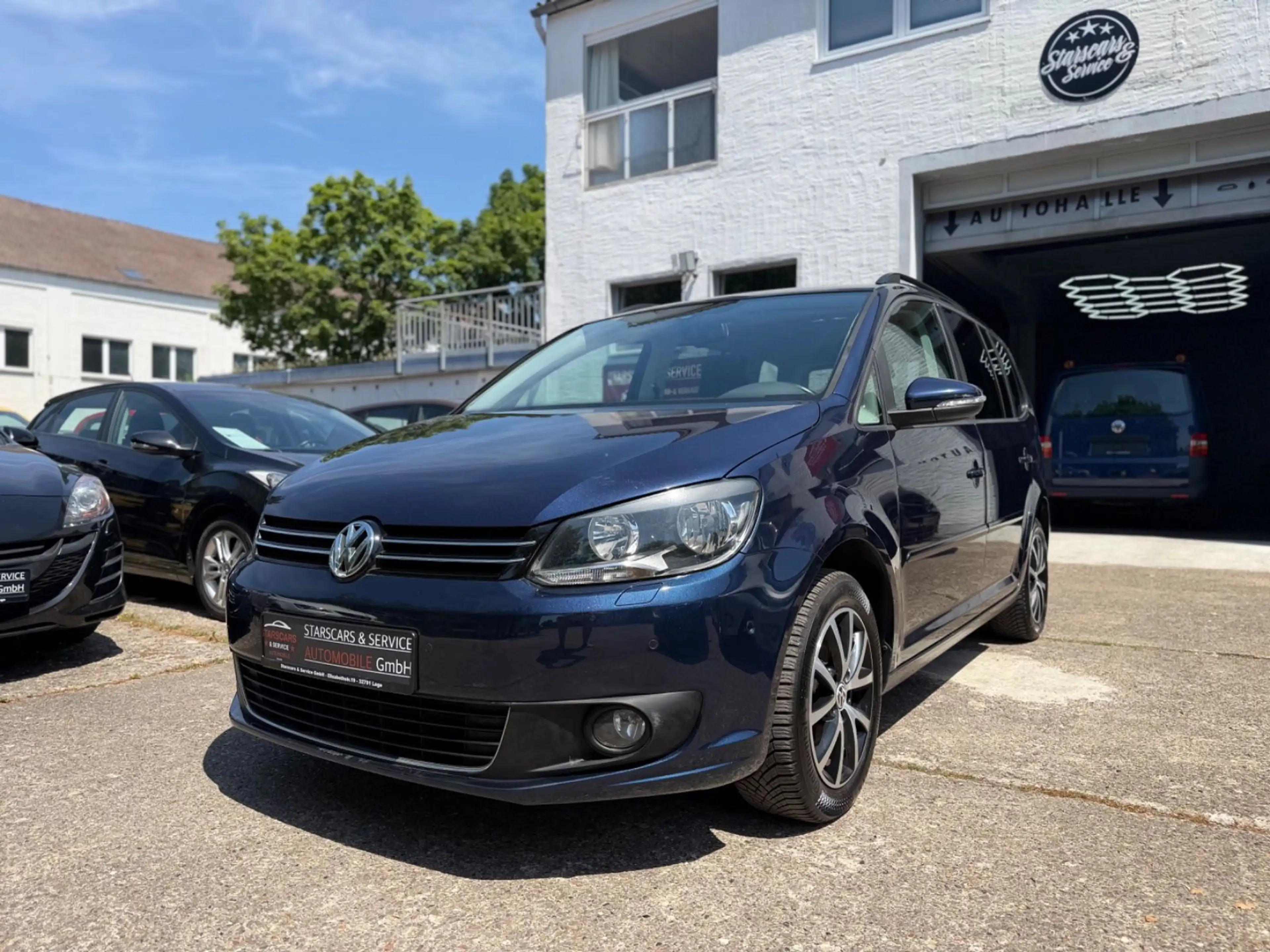 Volkswagen Touran *STANDHEIZUNG*TEMPO.*PDC*1.HAND*ALU*KLIMA*