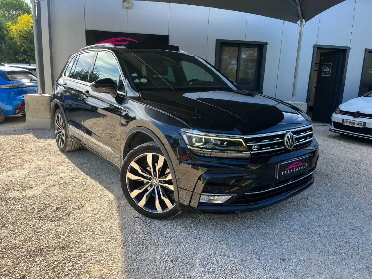 Volkswagen Tiguan II 2.0 TDI 150 ch Start/Stop DSG7 Carat Exclusive R-Line / Toit Ouvrant / Entretien Complet Noir - 1