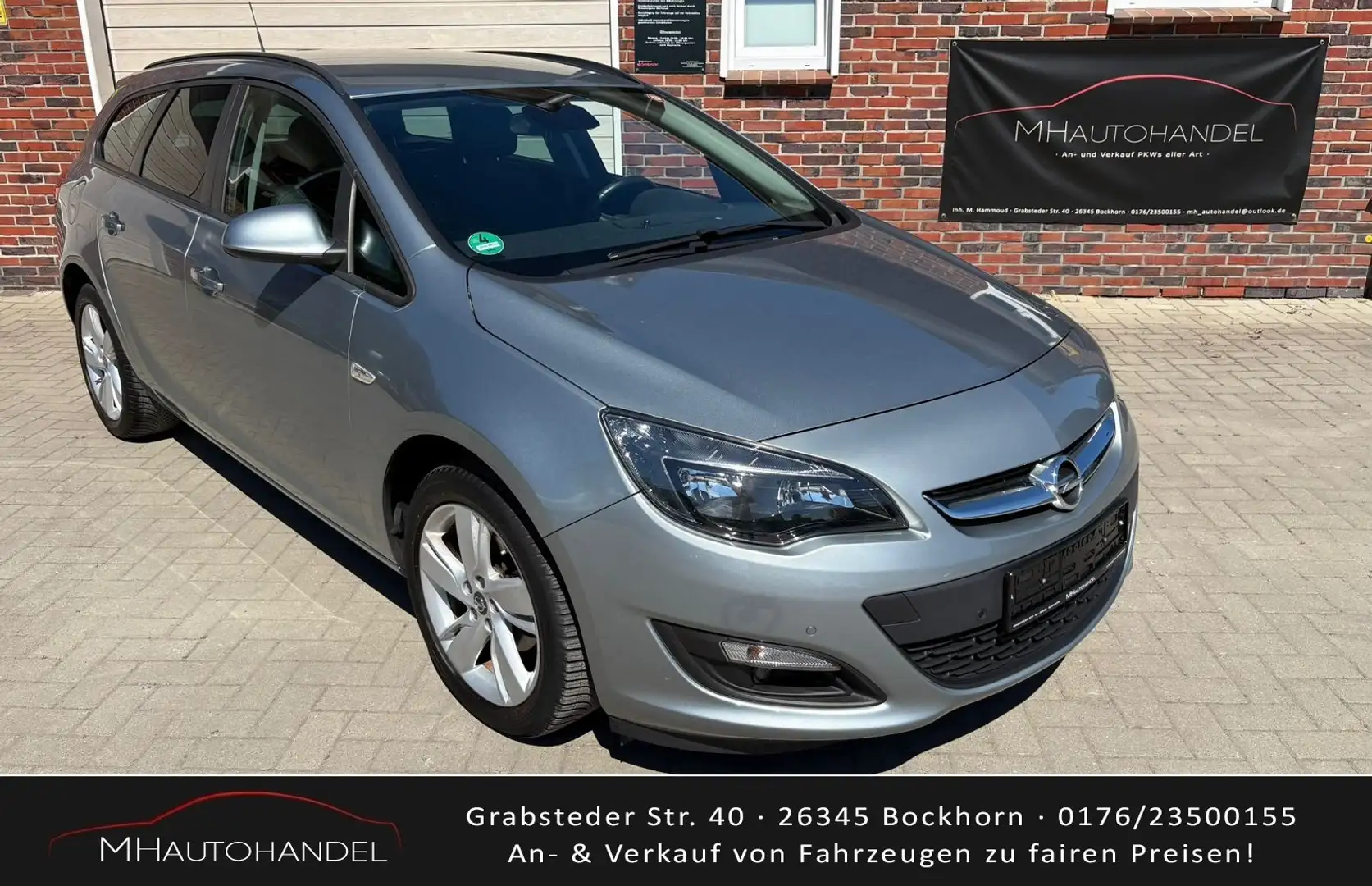 Opel Astra J Style 1.4*WenigKm*AHK*TopGepflegt*Finanzierung* Grigio - 1
