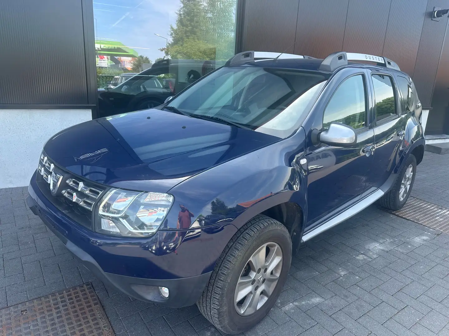 Dacia Duster 1.6i 4x2 Ambiance Blauw - 1