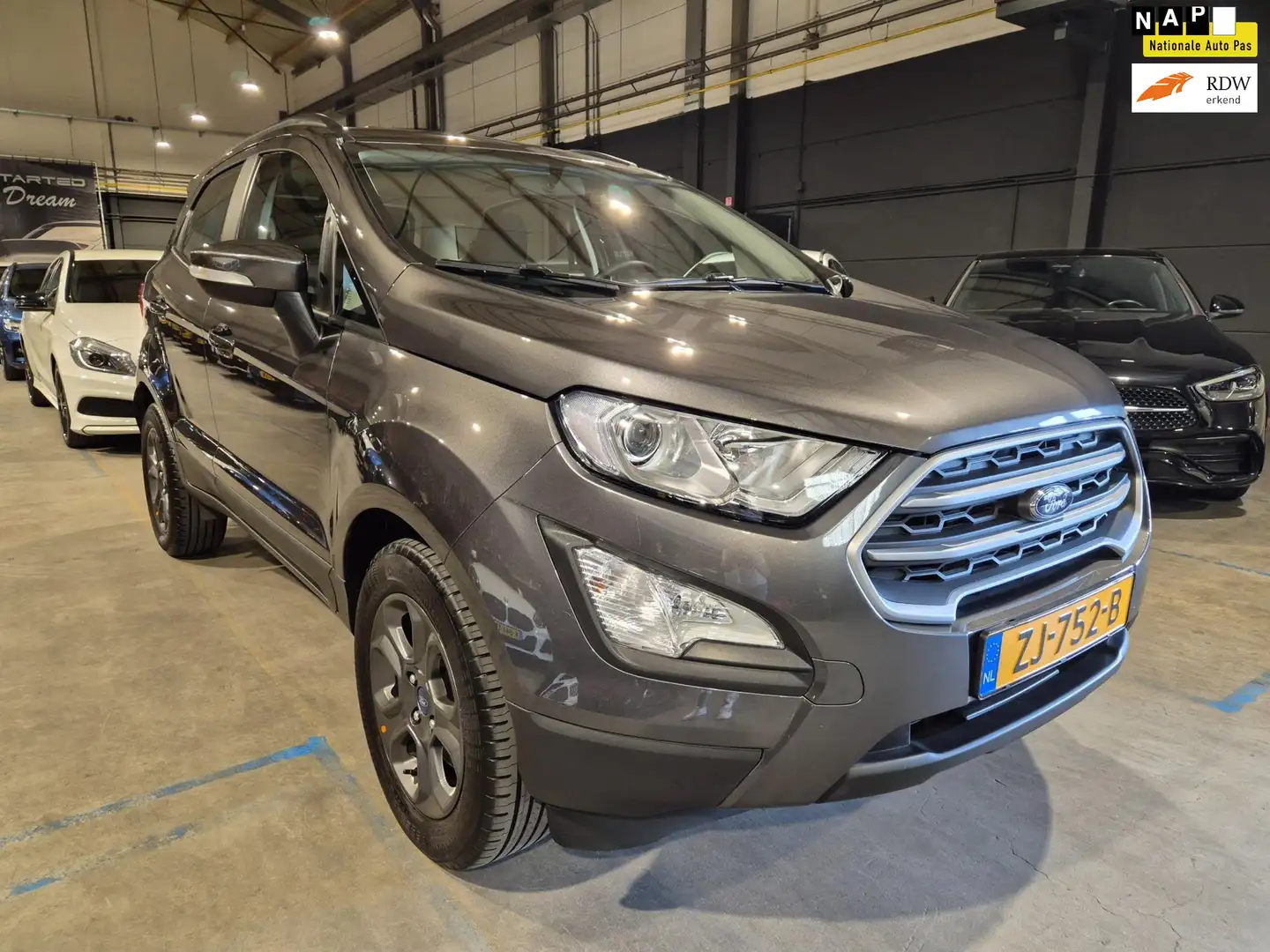 Ford EcoSport 1.0 EcoBoost Trend Ultimate - Airco - Cruise - Nav Grijs - 1