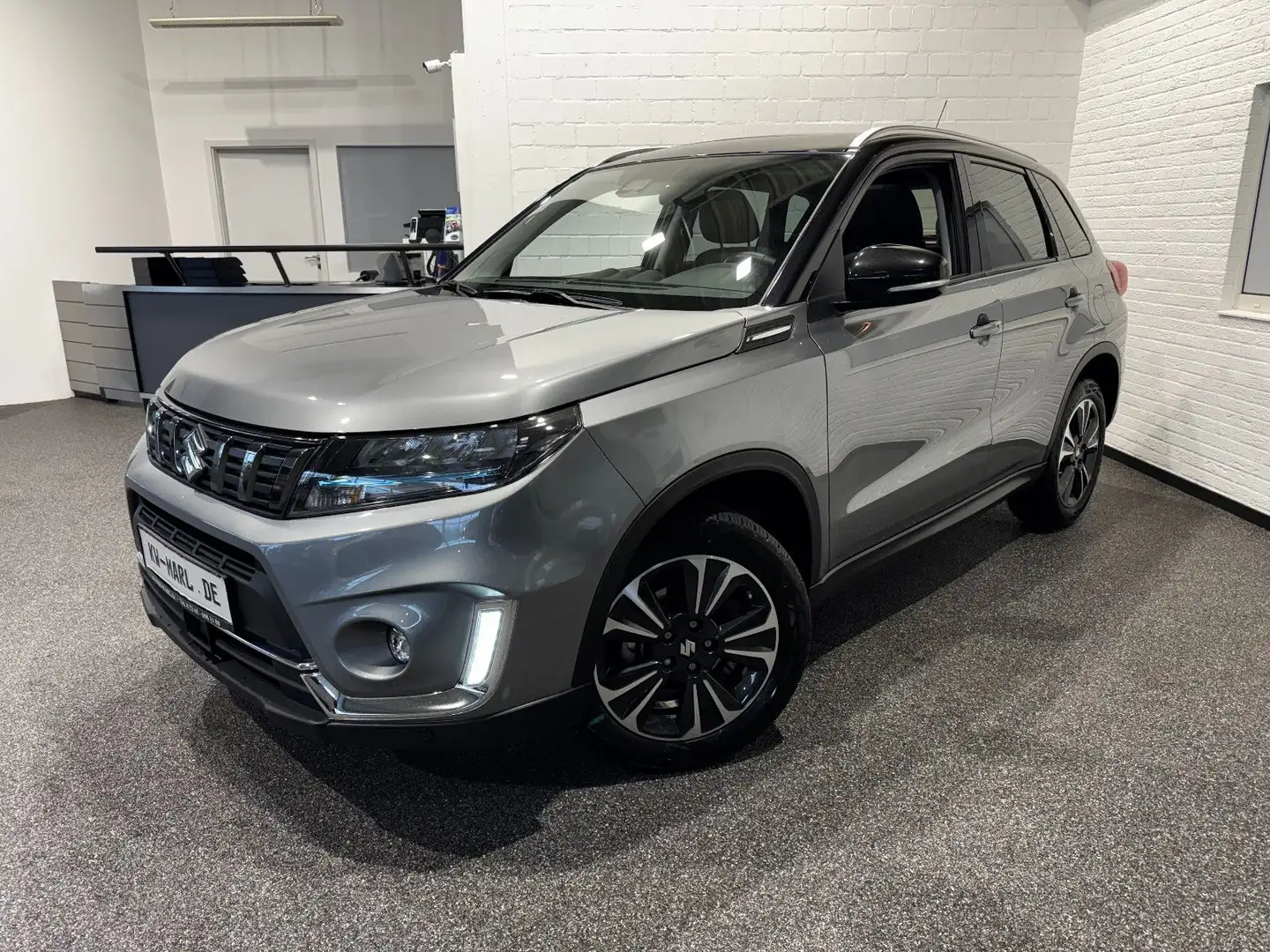 Suzuki Vitara 1.5 Hybrid Comfort+ 4x2 PANO NAVI+CAM ACC Grau - 1
