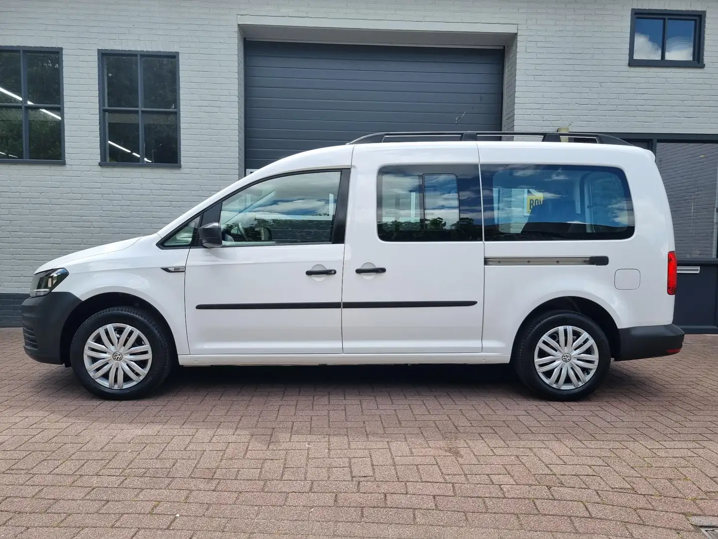 Volkswagen Caddy Maxi 1.4 TSI 7-Pers. 130 pk. NAVI / CRUISE / PDC / Wit - 2