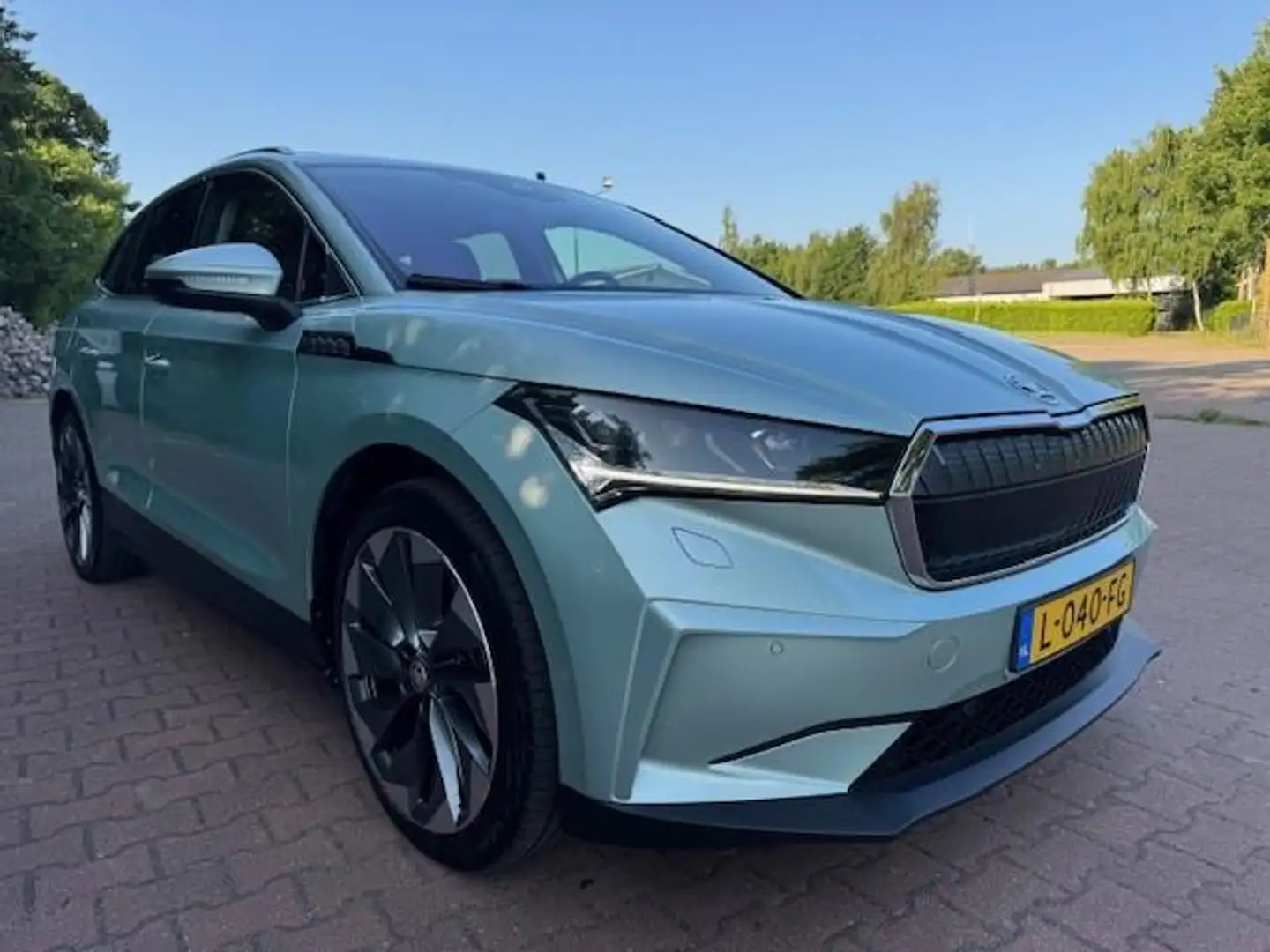 Skoda Enyaq IV 80 BEV 204PK 77KWH PLUS SPORTLINE/THAAK/PANO/LE Grijs - 1