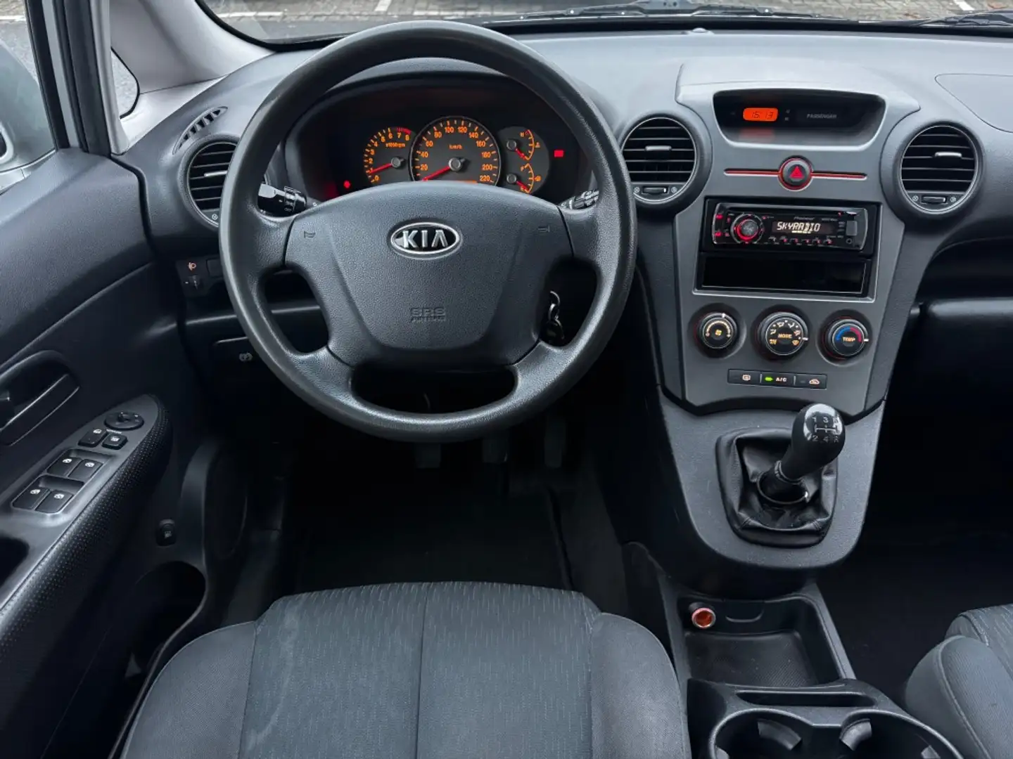 Kia Carens 2.0 CVVT X-tra 7p. AIRCO GOEDE AUTO NAP APK 4-2026 Grau - 2