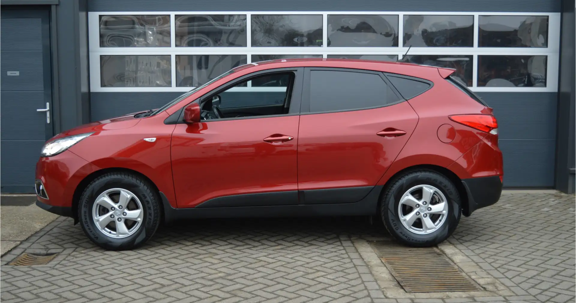Hyundai iX35 1.6i GDI Business Edition | Airco | Volledige hist Rood - 2