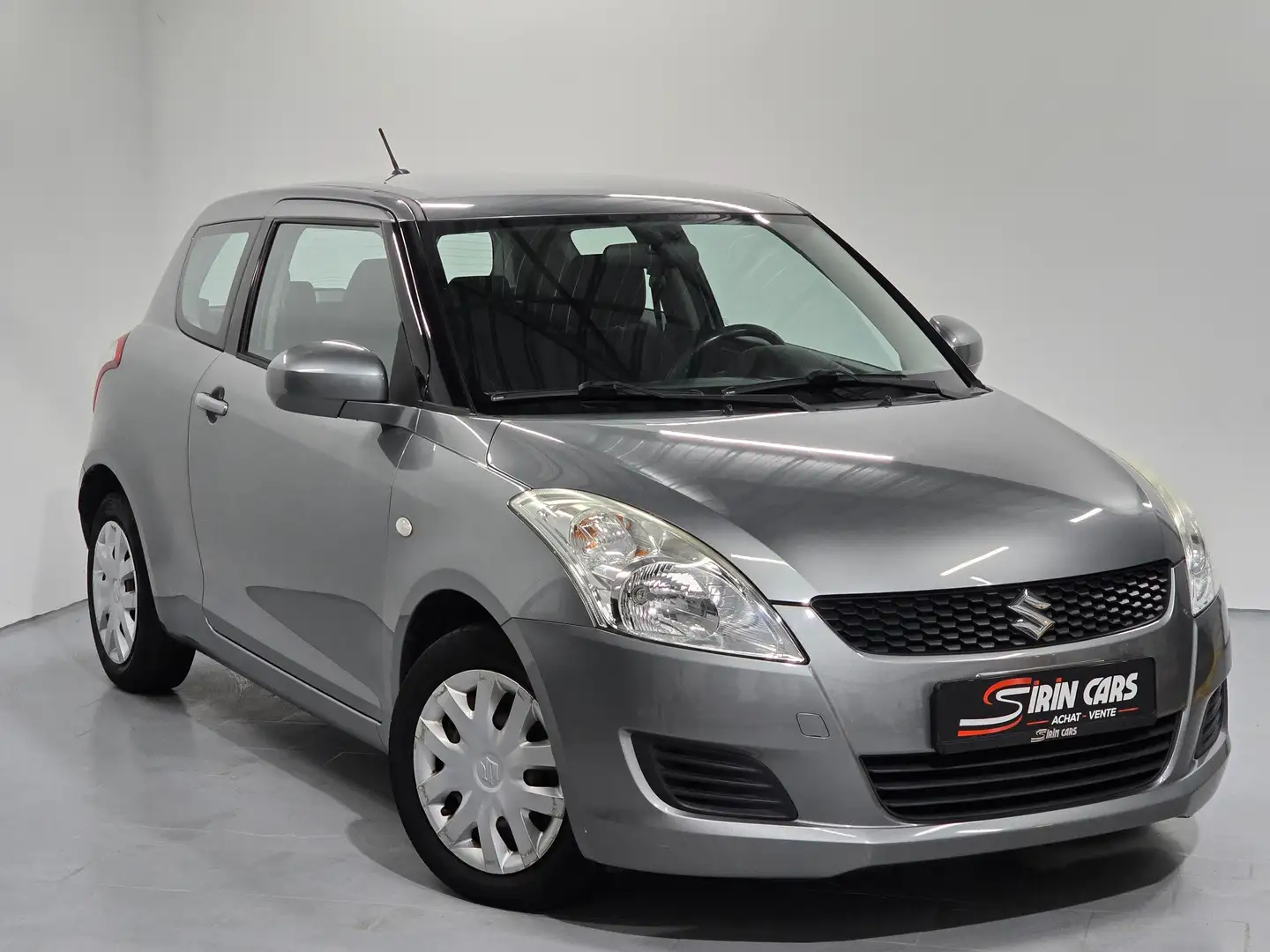 Suzuki Swift ́AIRCO * 1ier propriétaire * Garantie 12Mois + - 1