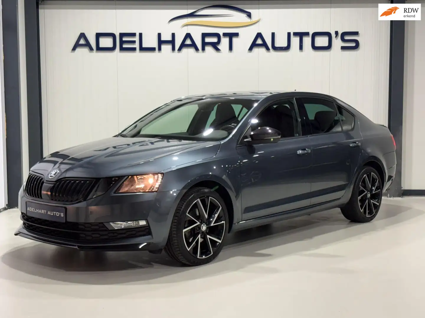 Skoda Octavia 1.5 TSI Greentech Sport Business DSG Automaat / Na Grigio - 1