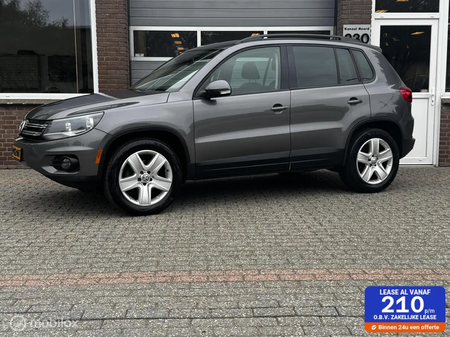 Volkswagen Tiguan 2.0 TSI 4Motion DSG LEDER/PANO/AIRCO/PANO Grijs - 1