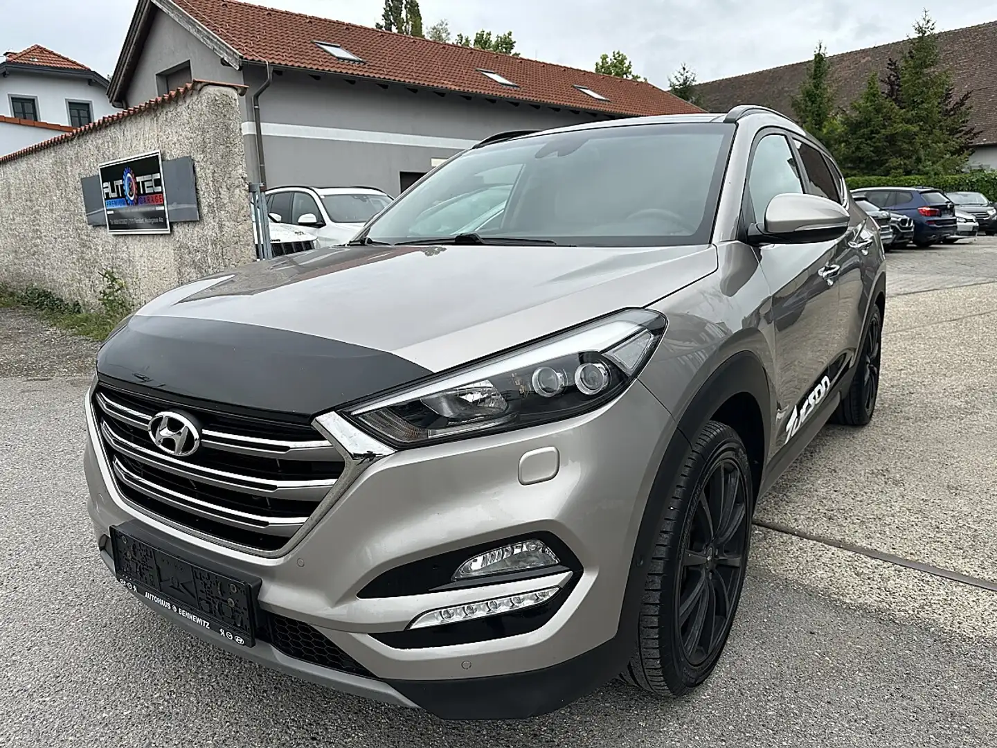Hyundai TUCSON Tucson 2,0 CRDI 4WD Platin Aut. Braun - 1
