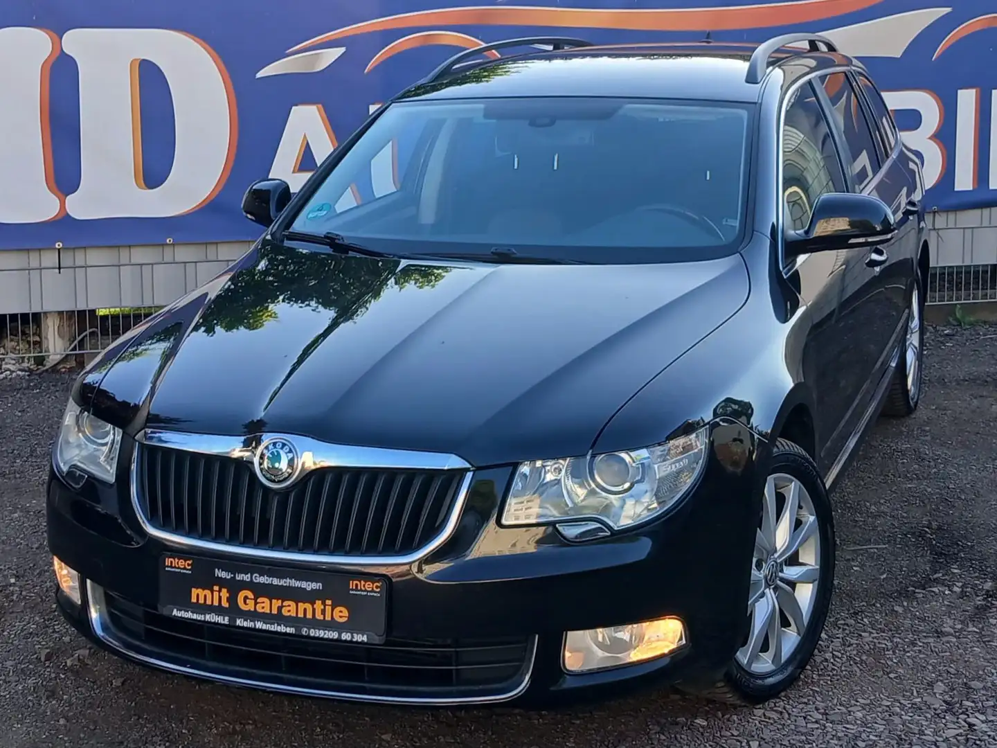 Skoda Superb 2,0 TDI Exclusive *DSG*NAVI*1.HAND*HU/TÜV NEU* Black - 1