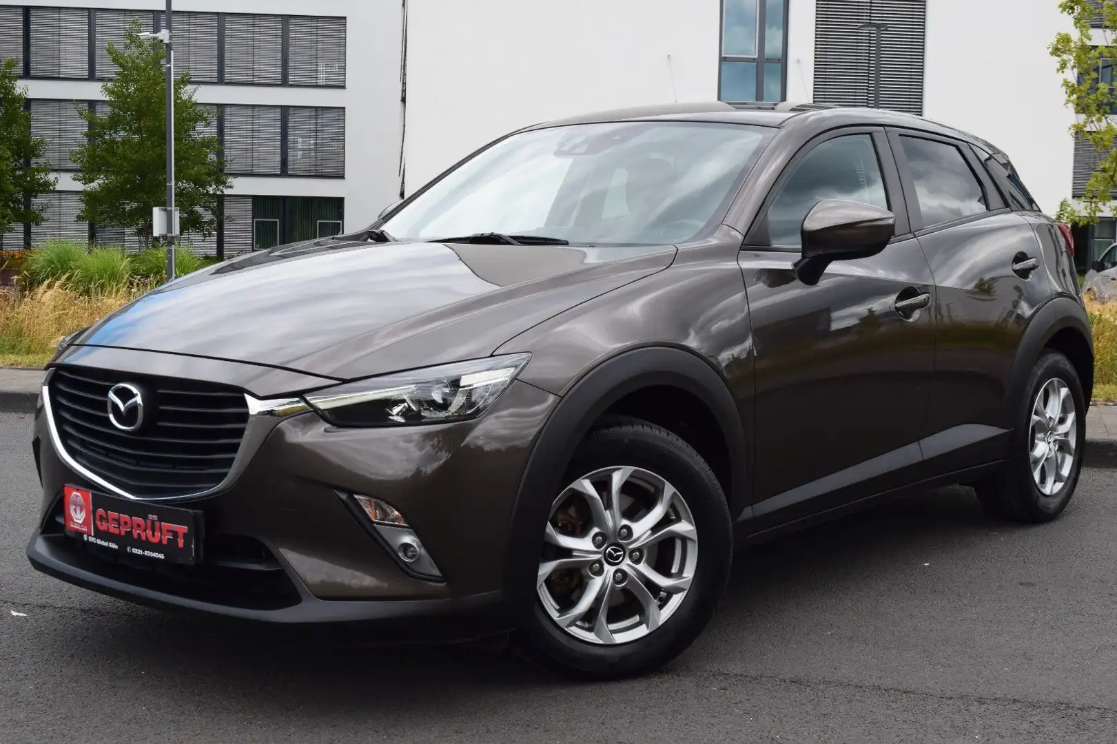Mazda CX-3 Exclusive-Line Automatik,Navi,8-Fachbereift Gris - 1
