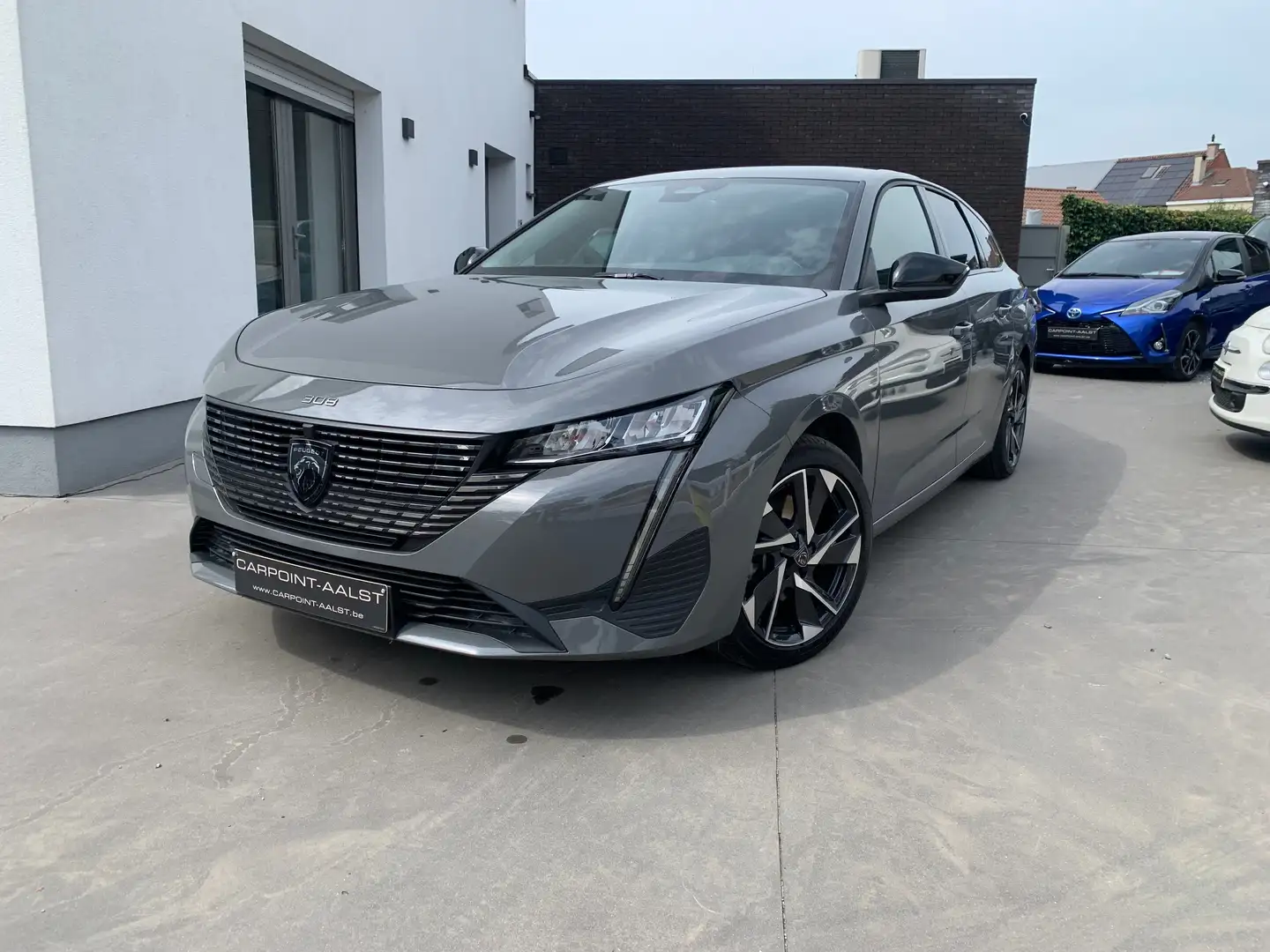 Peugeot 308 308 SW Hybrid 136e-DSC6 Allure met garantie Grijs - 1