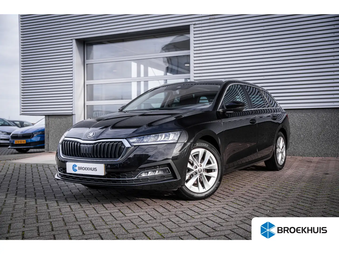Skoda Octavia Combi 1.0 e-TSI Business Edition Plus | Elektrisch Noir - 1