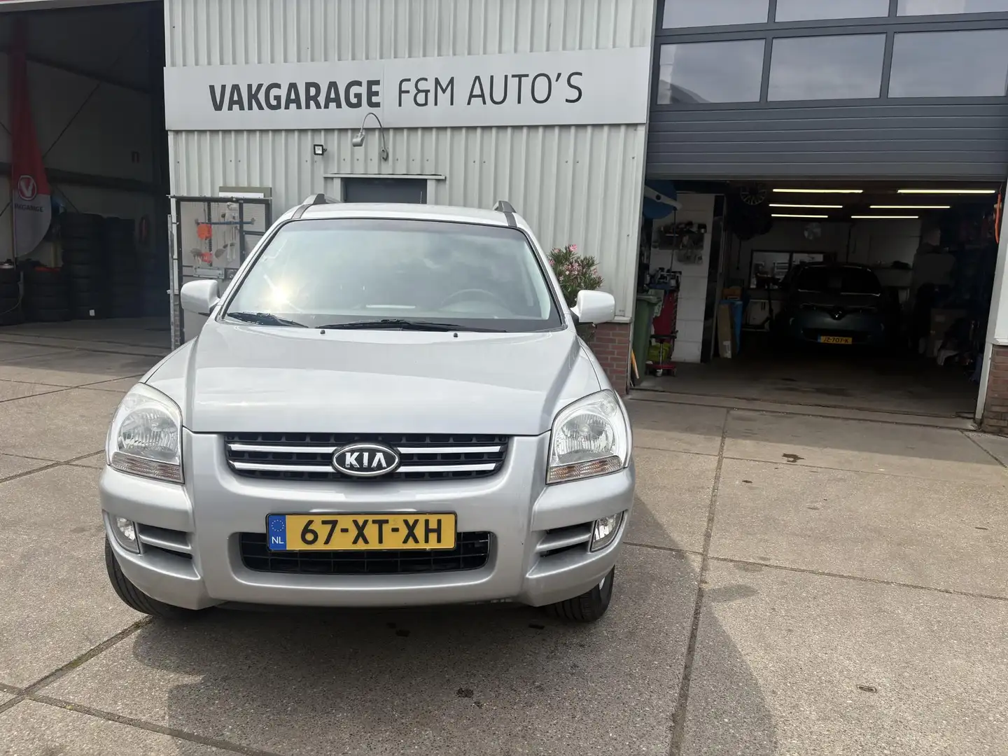 Kia Sportage 2.0 CVVT Comfort Grijs - 2