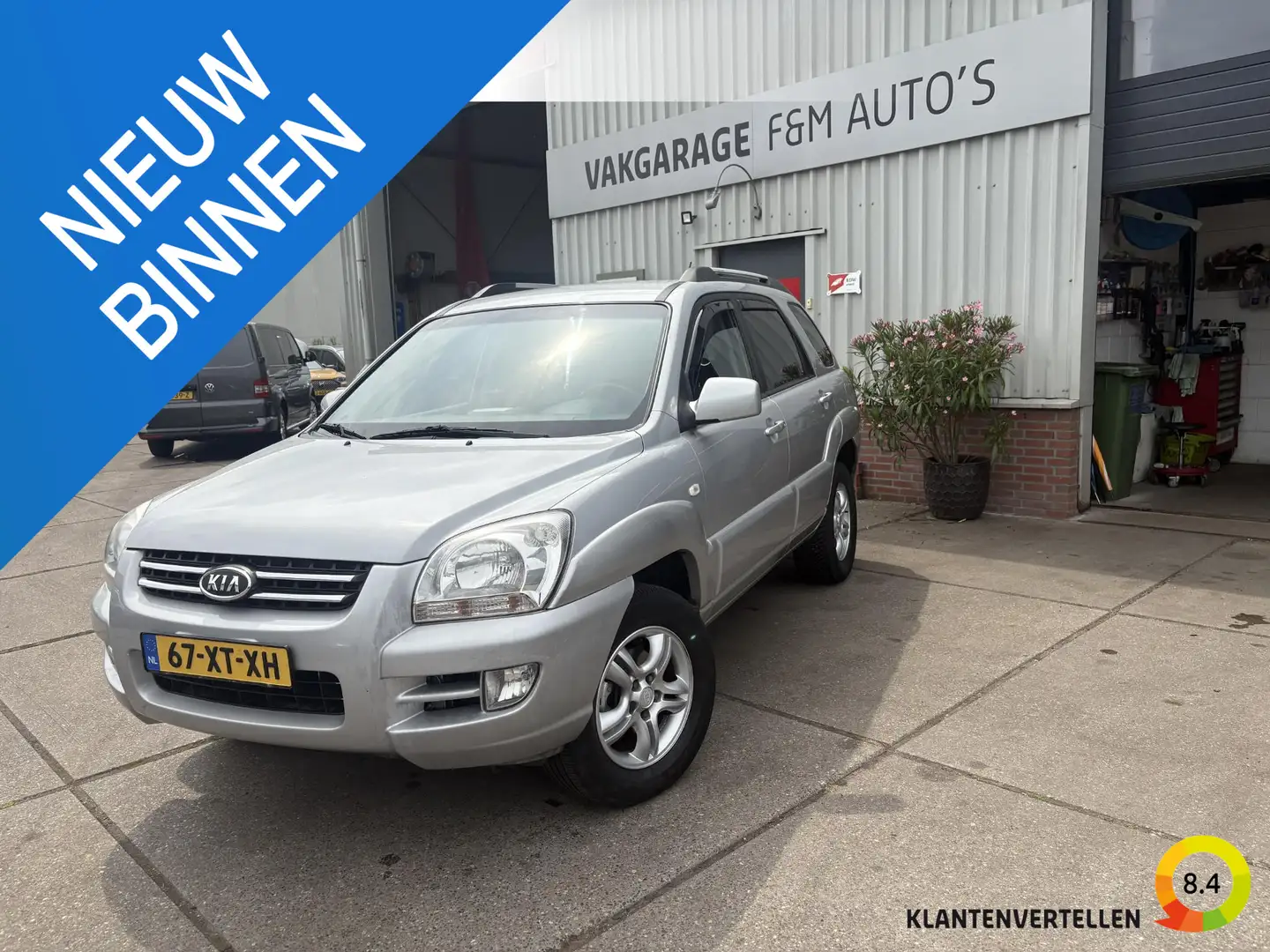 Kia Sportage 2.0 CVVT Comfort Grijs - 1