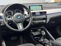BMW X2 SDrive20i High Executive Pano/Camera Blauw - thumbnail 12