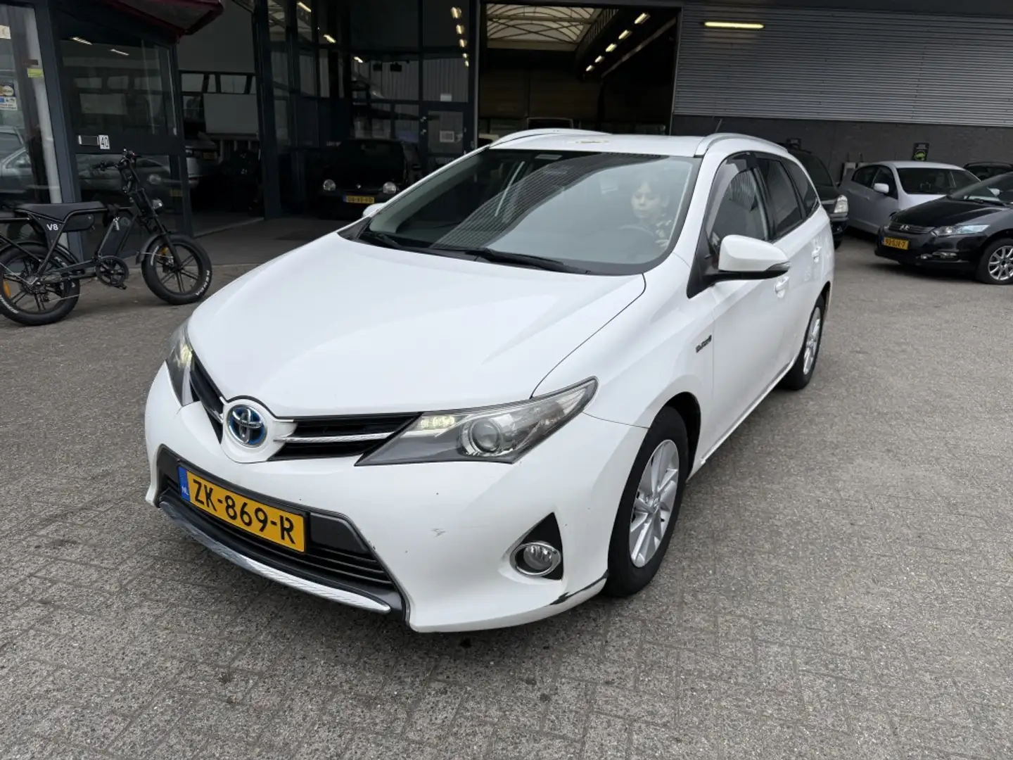 Toyota Auris Touring Sports 1.8 Hybr. Aspiration Wit - 1