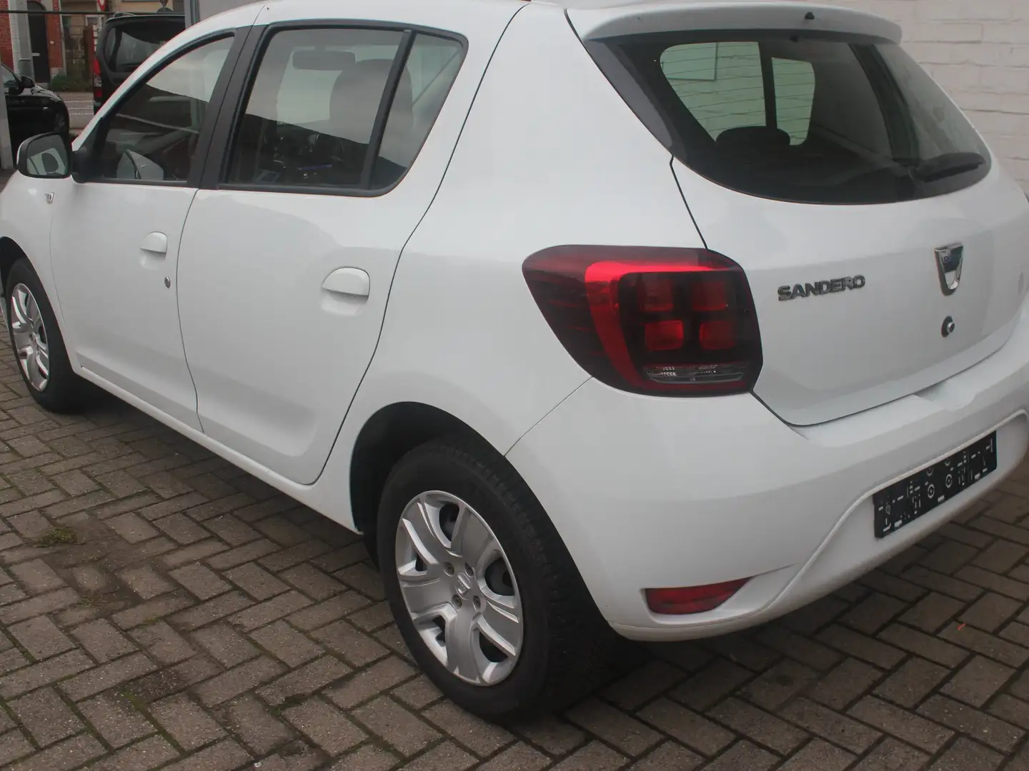 Dacia Sandero 1.0i SCe + GPS + airco + Garantie Wit - 2