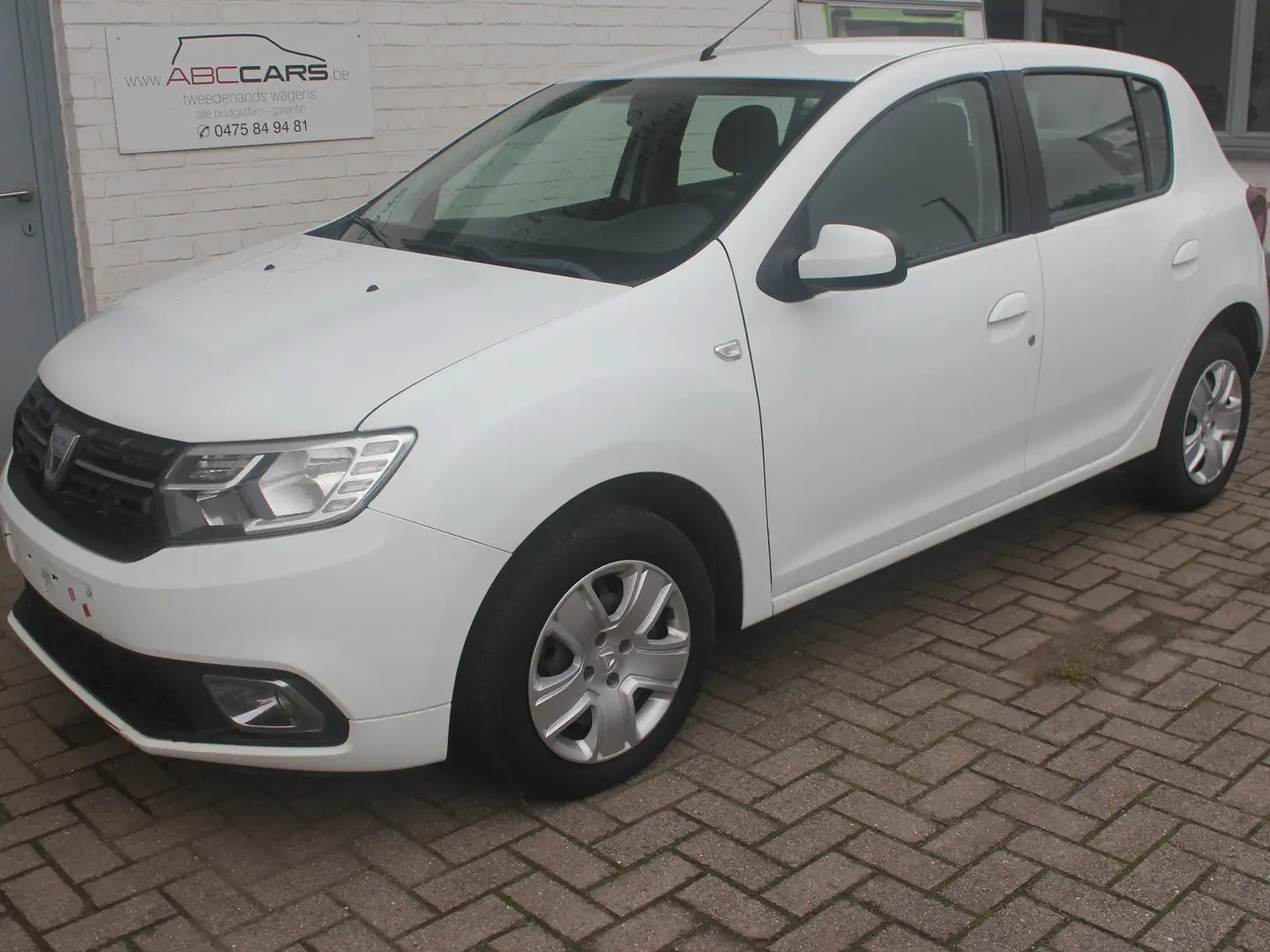 Dacia Sandero 1.0i SCe + GPS + airco + Garantie Wit - 1
