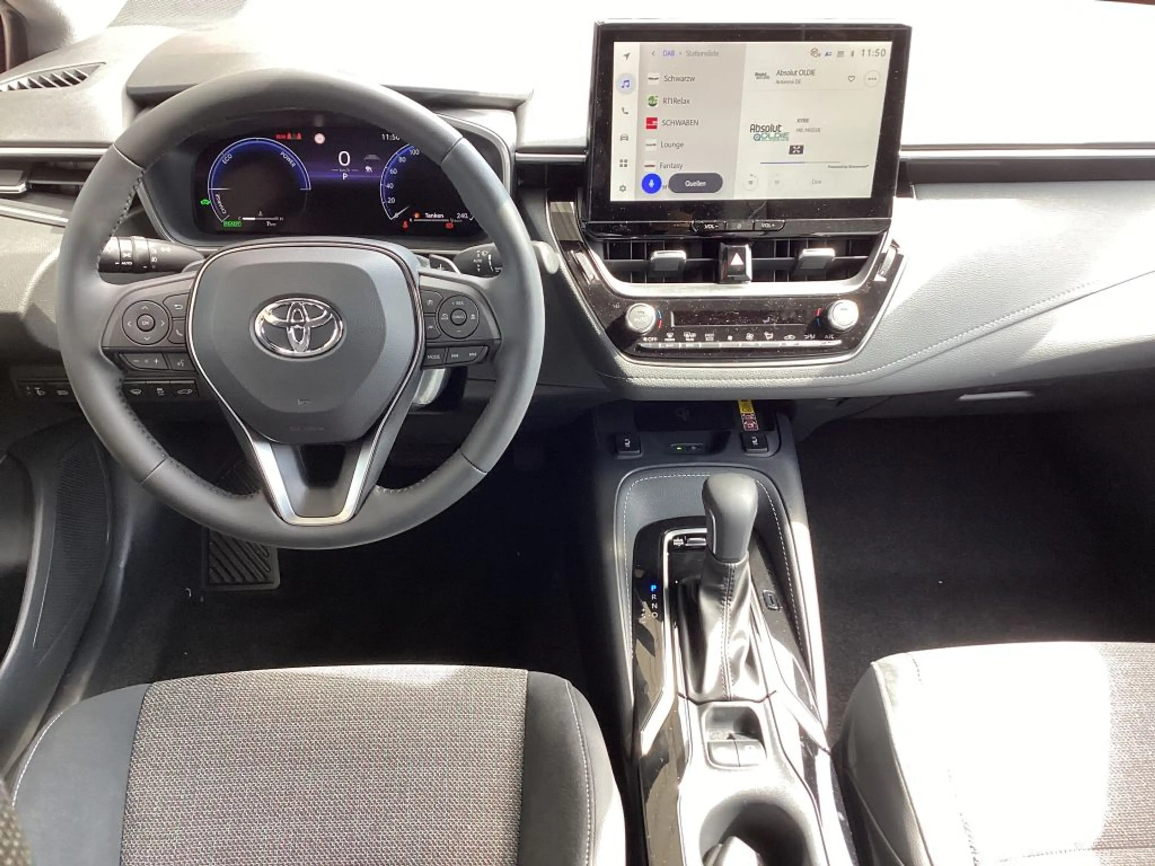 Toyota Corolla 1.8 Hybrid Touring Sports Teamplayer — photo 8