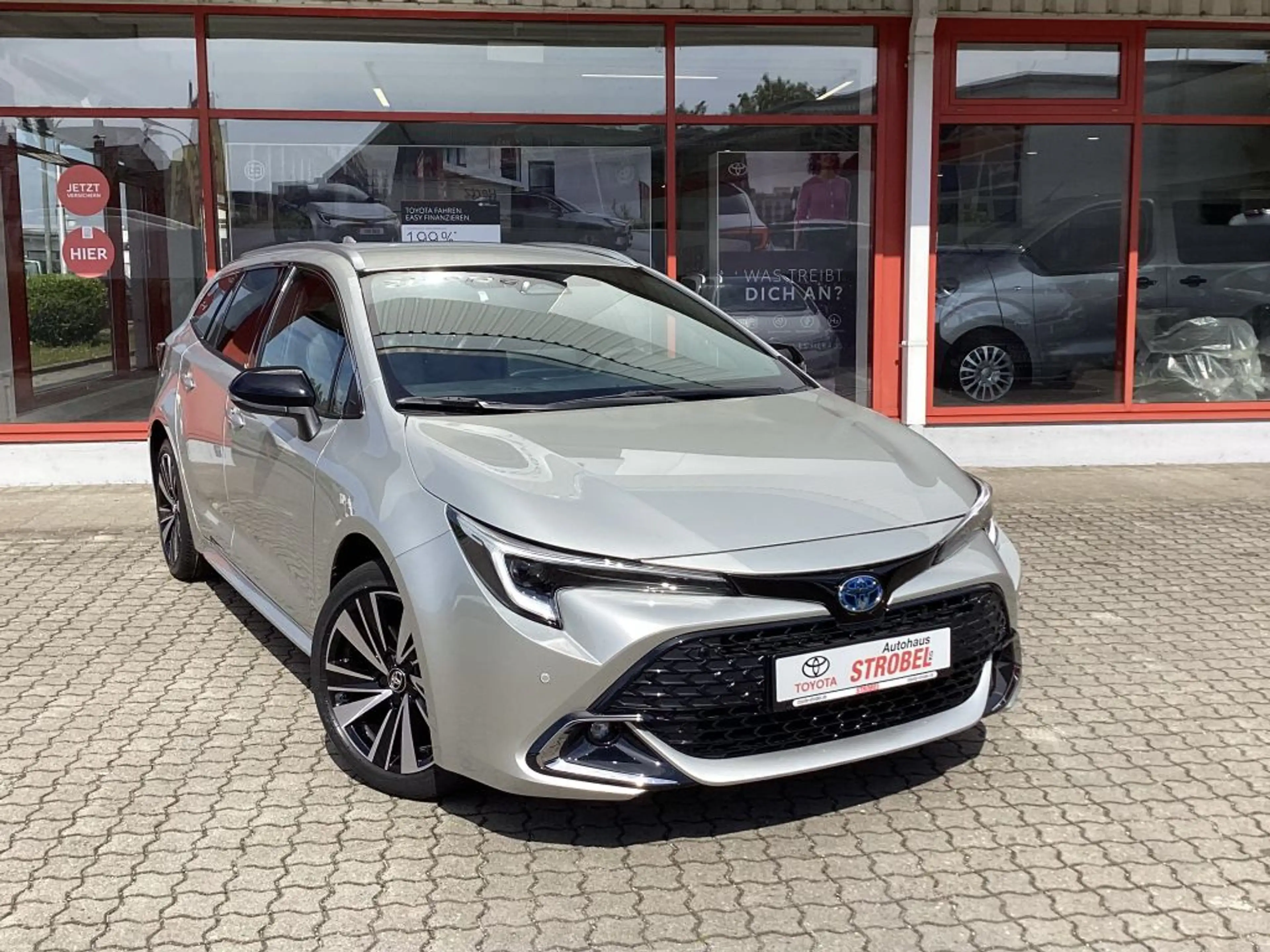 Toyota Corolla 1.8 Hybrid Touring Sports Teamplayer — photo 6