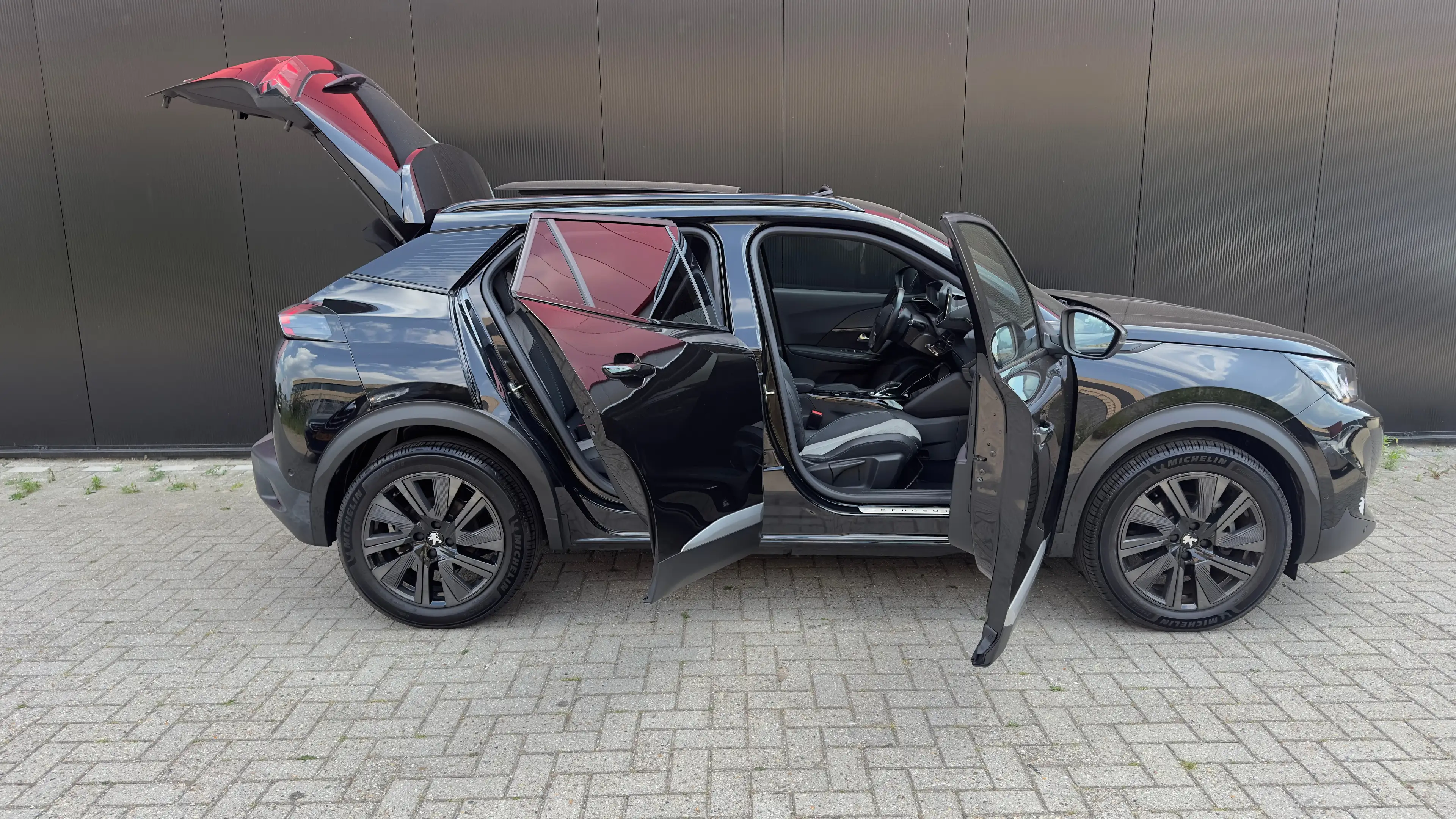 Peugeot e-2008 EV GT Pack 50 kWh | Panorama Dak | Stoelverwarming — photo 12