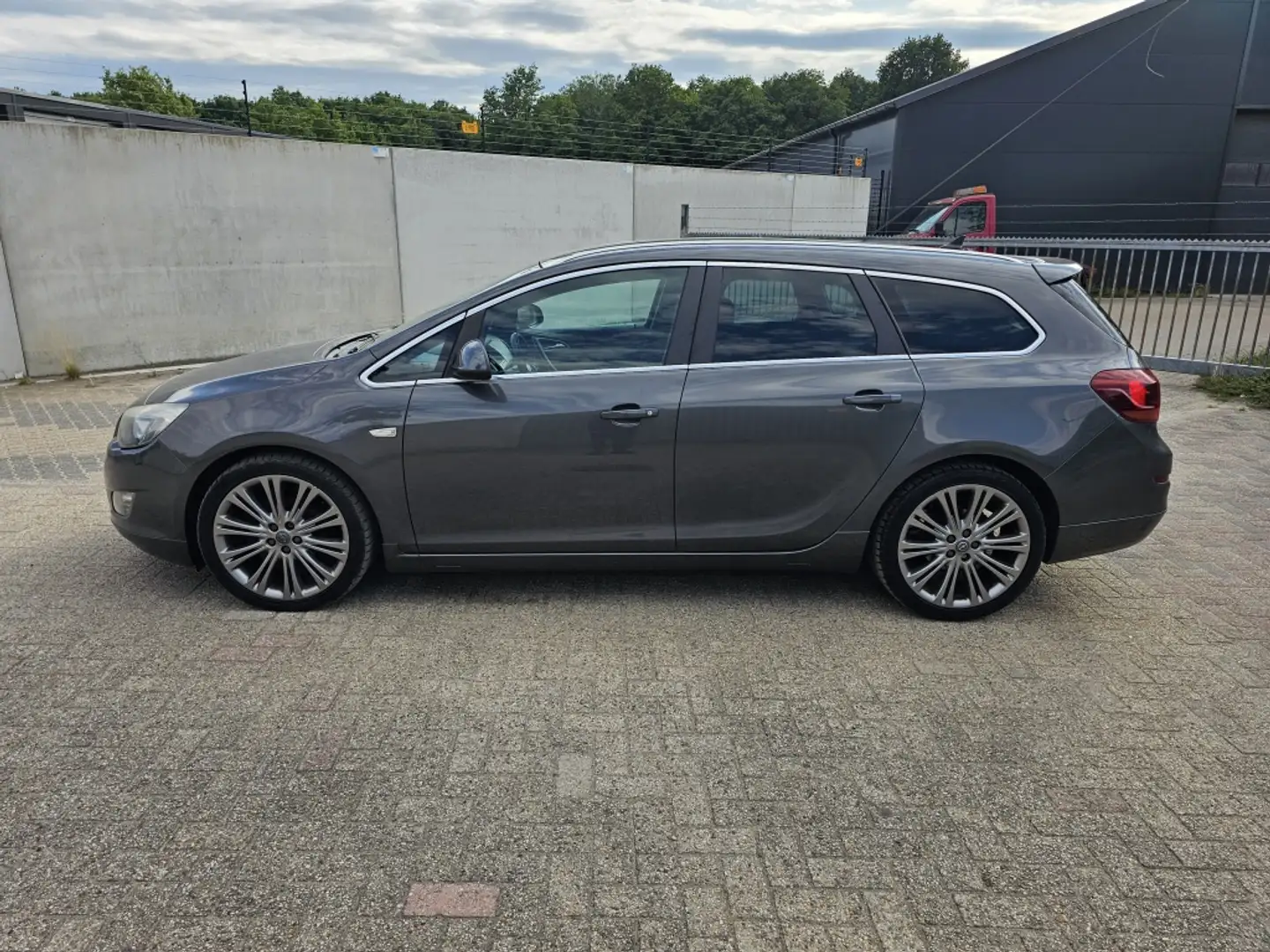 Opel Astra Sports Tourer 1.4 Turbo Sport,Nap,Airco.Apk Grijs - 2