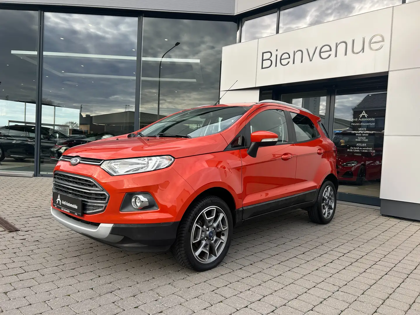 Ford EcoSport 1.0 *GARANTIE*BLUETOOTH*CAPTEURS*AIRCO*CRUISE* Orange - 1