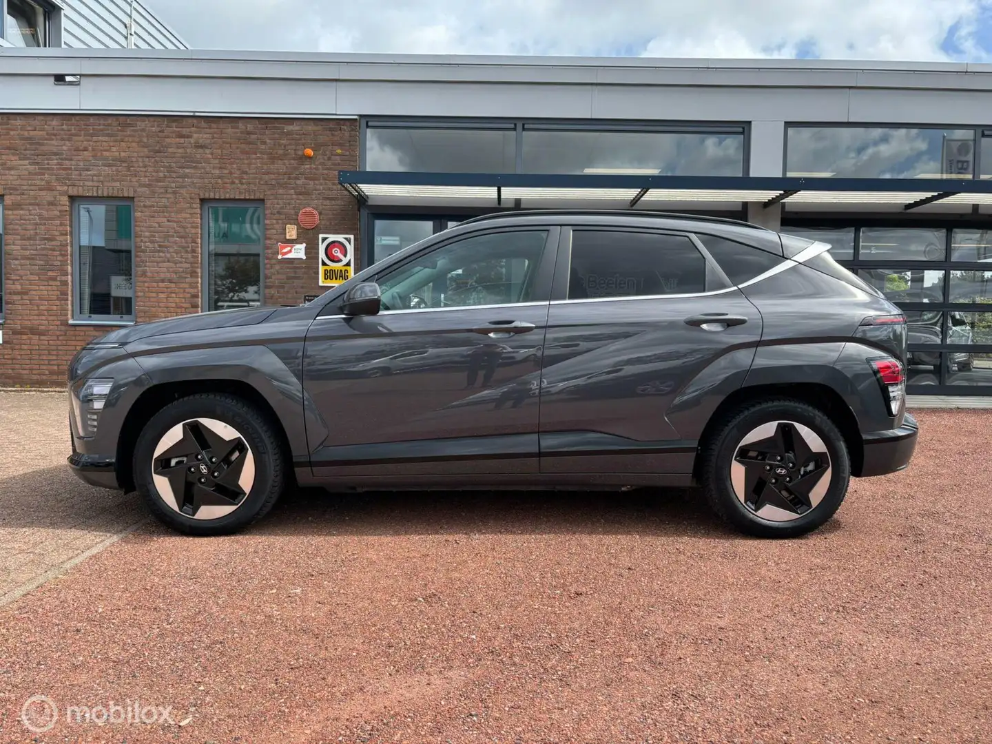 Hyundai KONA Electric Comfort Smart 65.4 kWh | Warmtepomp | Tre Grigio - 2
