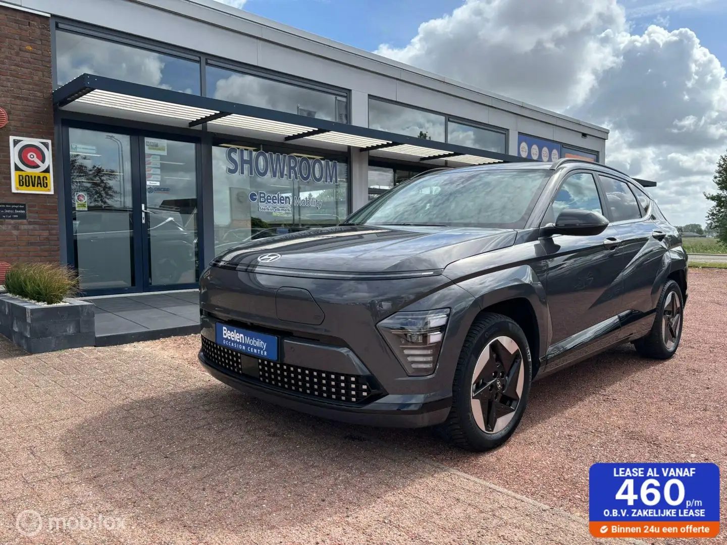 Hyundai KONA Electric Comfort Smart 65.4 kWh | Warmtepomp | Tre Grijs - 1