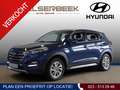 Hyundai TUCSON 1.6 GDi Comfort *AIRCO / LMV / NAVIGATIE / CAMERA* Blauw - thumbnail 1