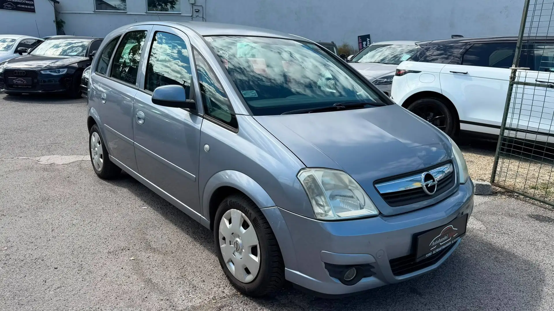 Opel Meriva 1,4 Edition mit Parkhilfe Klima CDRadio Metallic Grau - 1