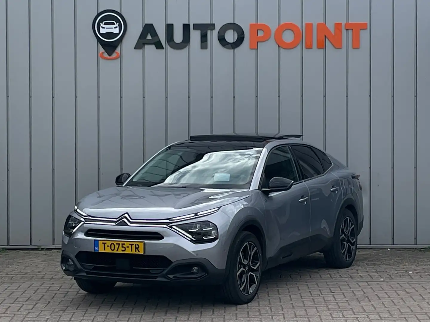 Citroen E-C4 X Shine 54 kWh ORG NL 1E EIG DEALEROND|PANO|TREKHAAK Grau - 1