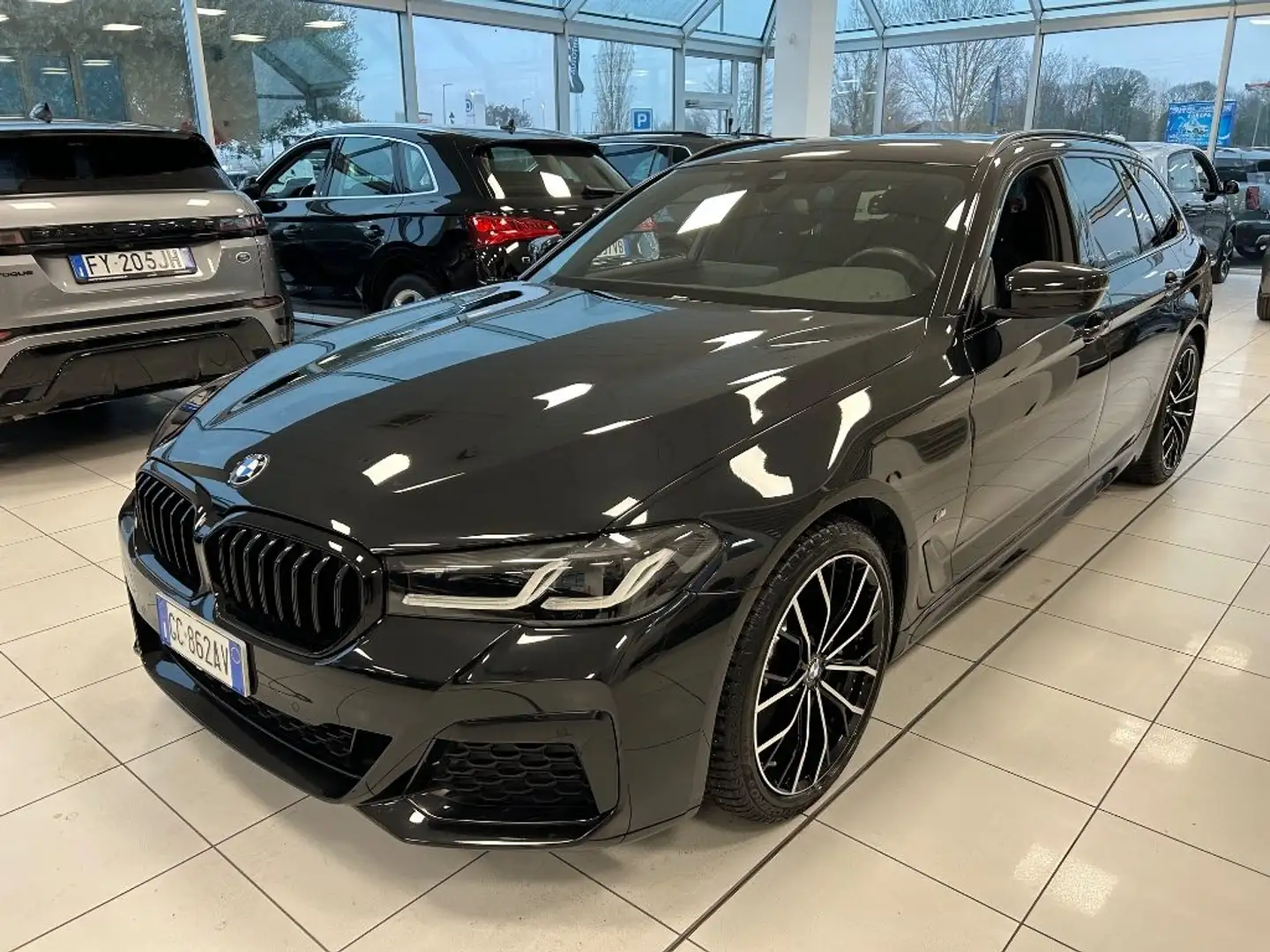 BMW 520 d 48V xDrive Touring Msport auto Zwart - 1