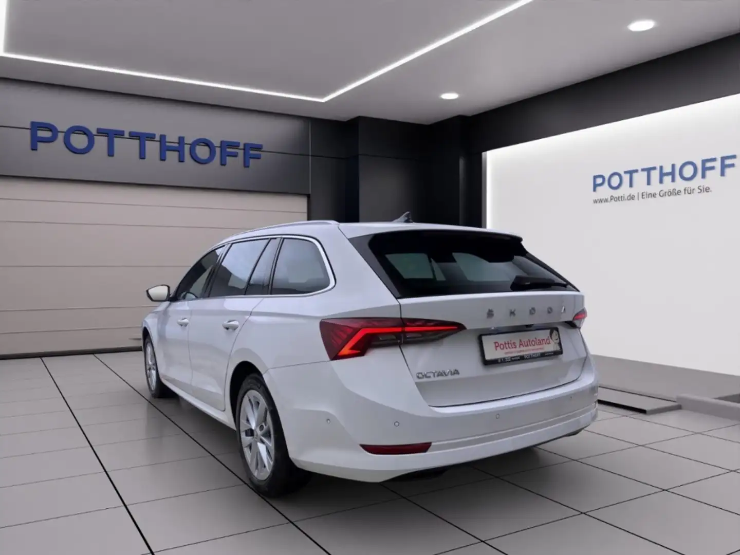 Skoda Octavia Combi 2.0 TDI DSG STYLE NAVI AHK PDC ACC Weiß - 2