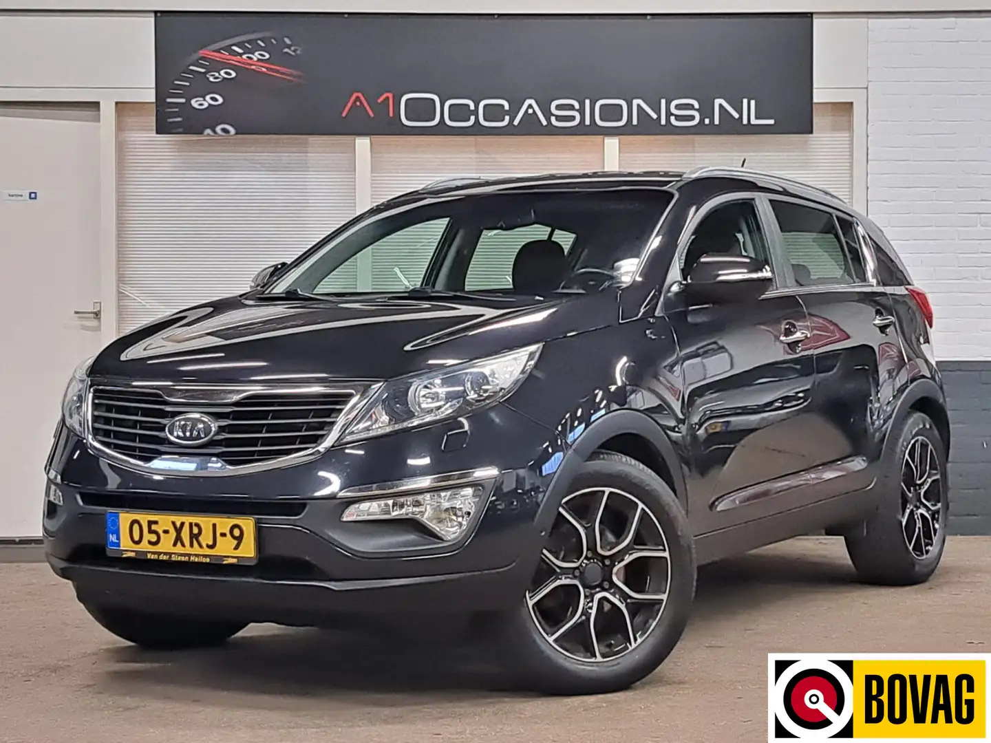 Kia Sportage 1.6 GDI Super Pack + LEDER + NAVI + STOELVERWARMIN Noir - 1