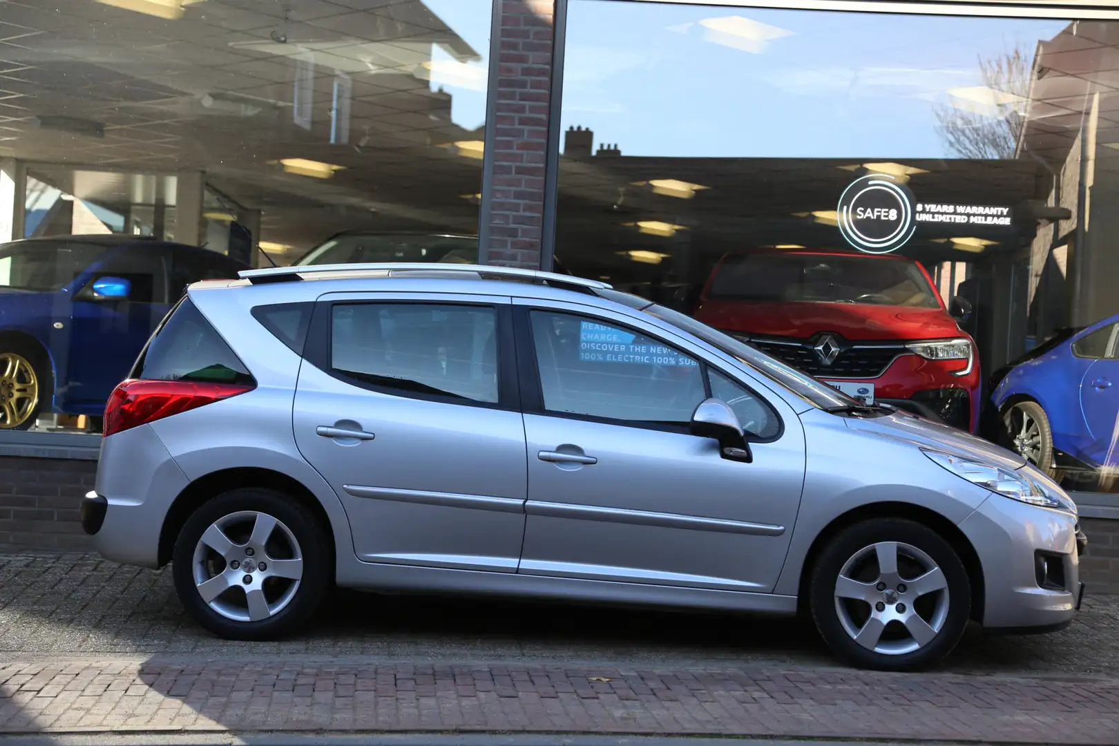 Peugeot 207 SW 1.6 VTi Première Panorama Navi Grijs - 2